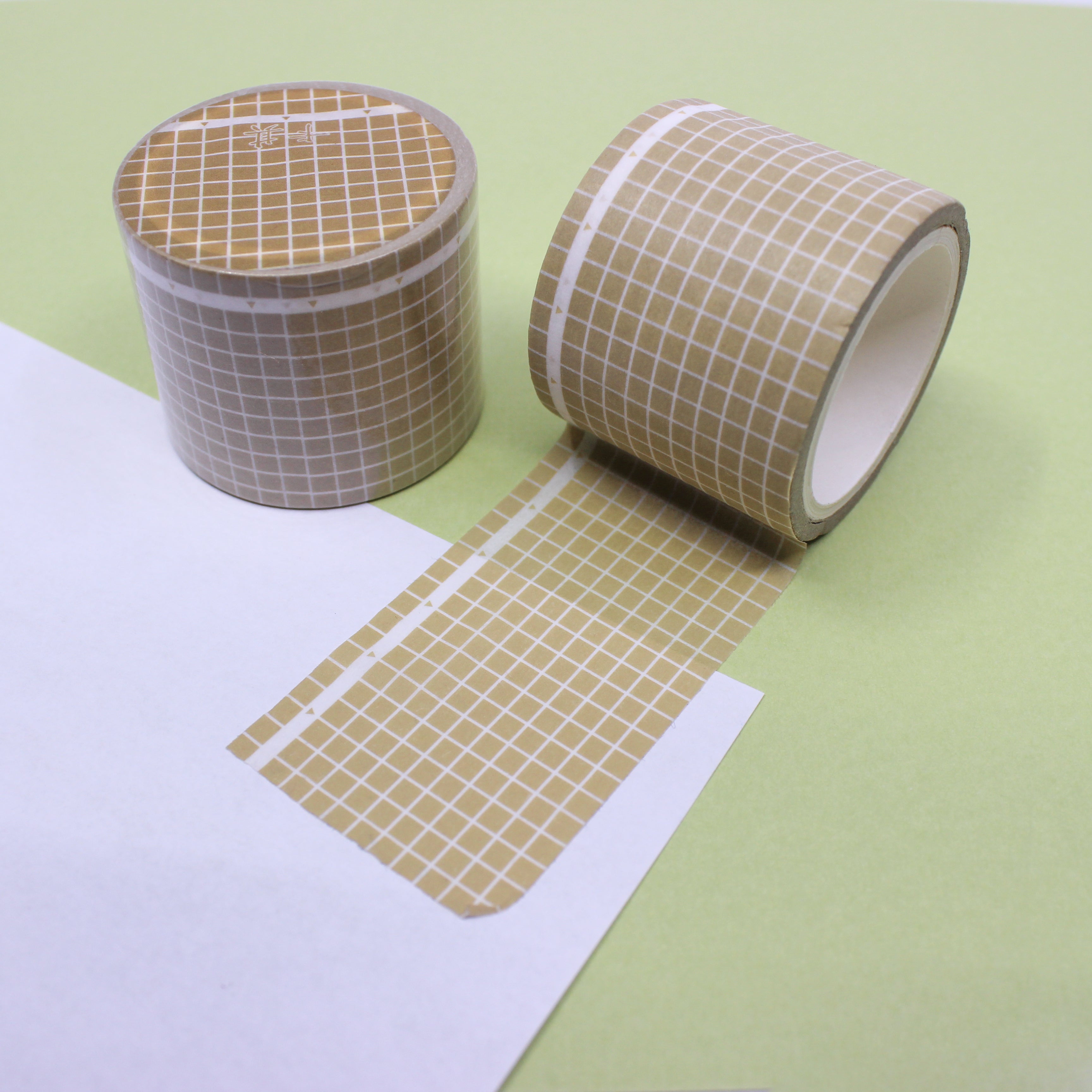 This is a khaki wide grid view themed washi tape from BBB Supplies Craft Shop