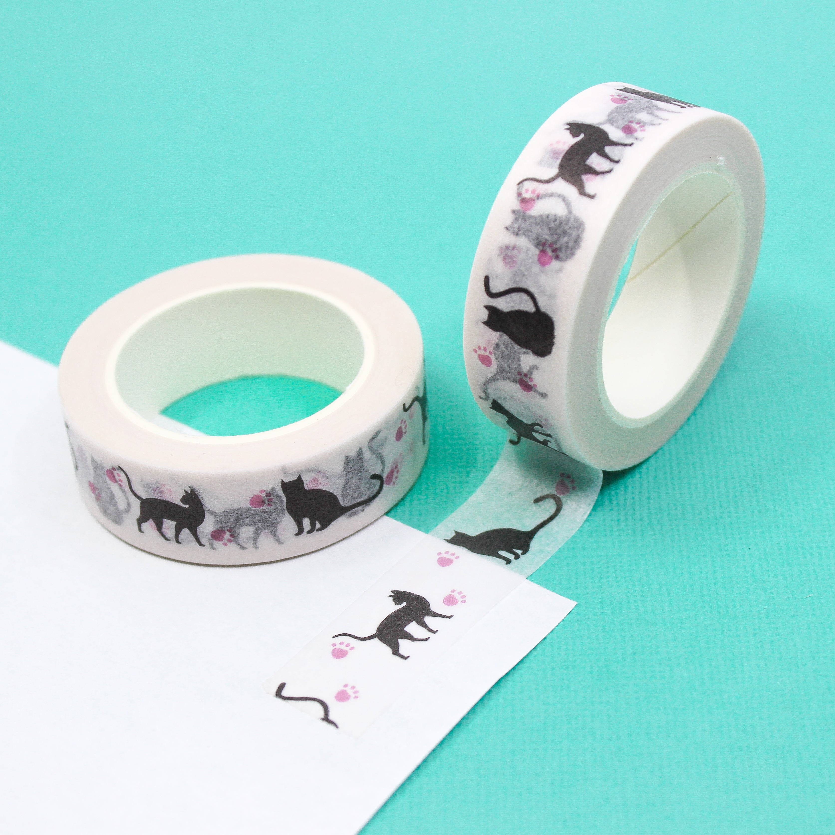 This is a black cats with heart in the tail view themed washi tape from BBB Supplies Craft Shop