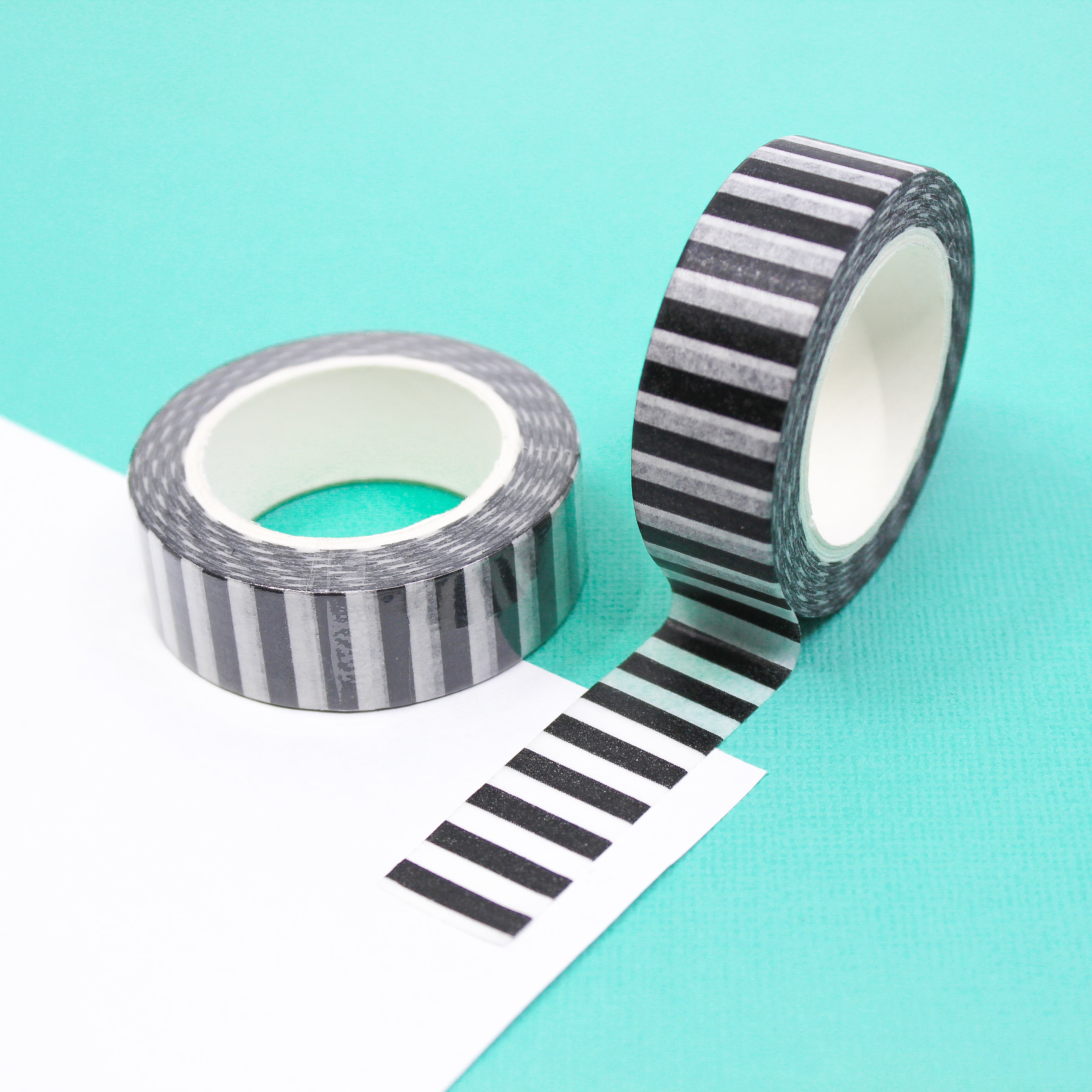 This is a black and white horizontal stripe view themed washi tape from BBB Supplies Craft Shop