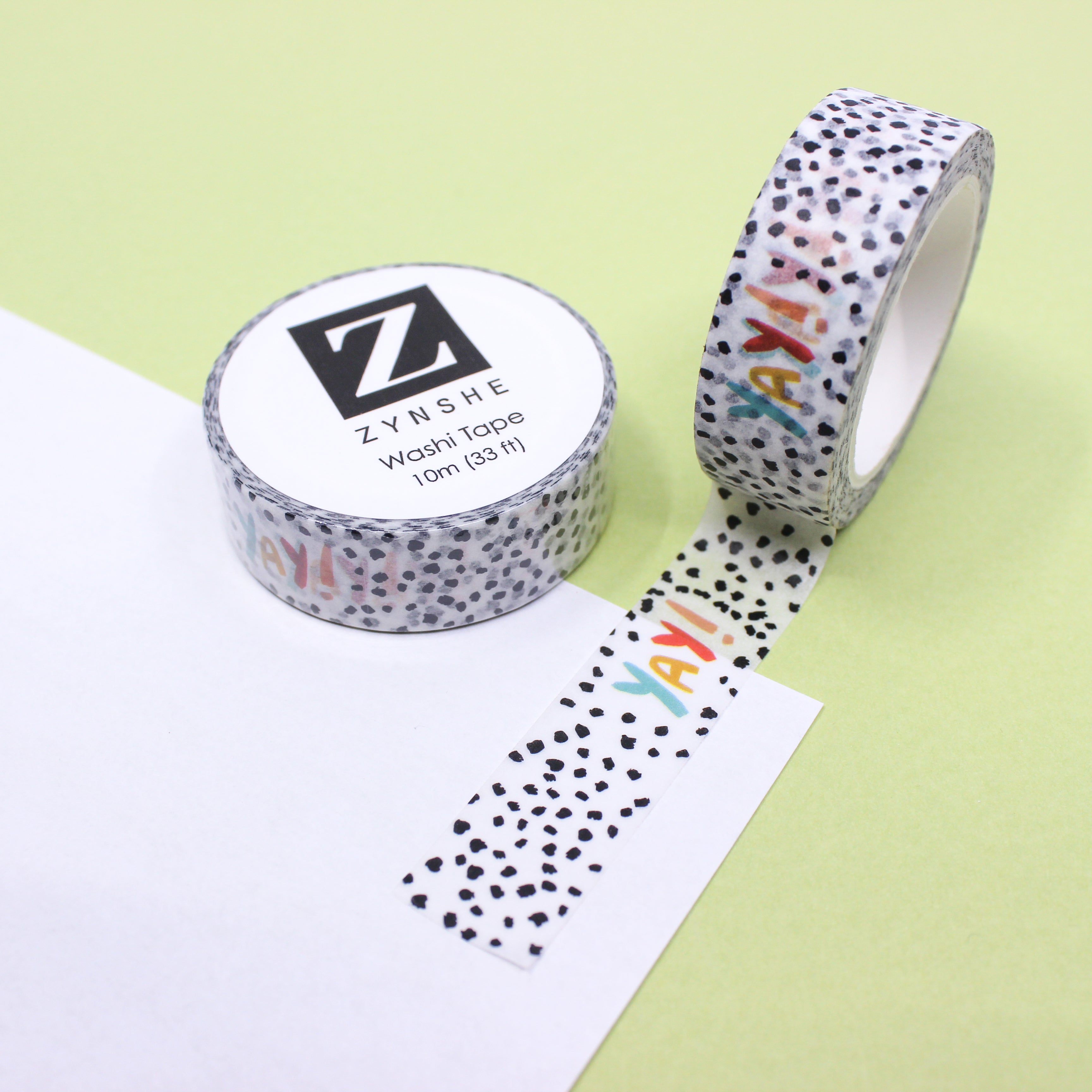 This is a fun and colorful YAY! Text washi tape on a black and white speckled background from BBB Supplies Craft Shop and created by Zynshe.