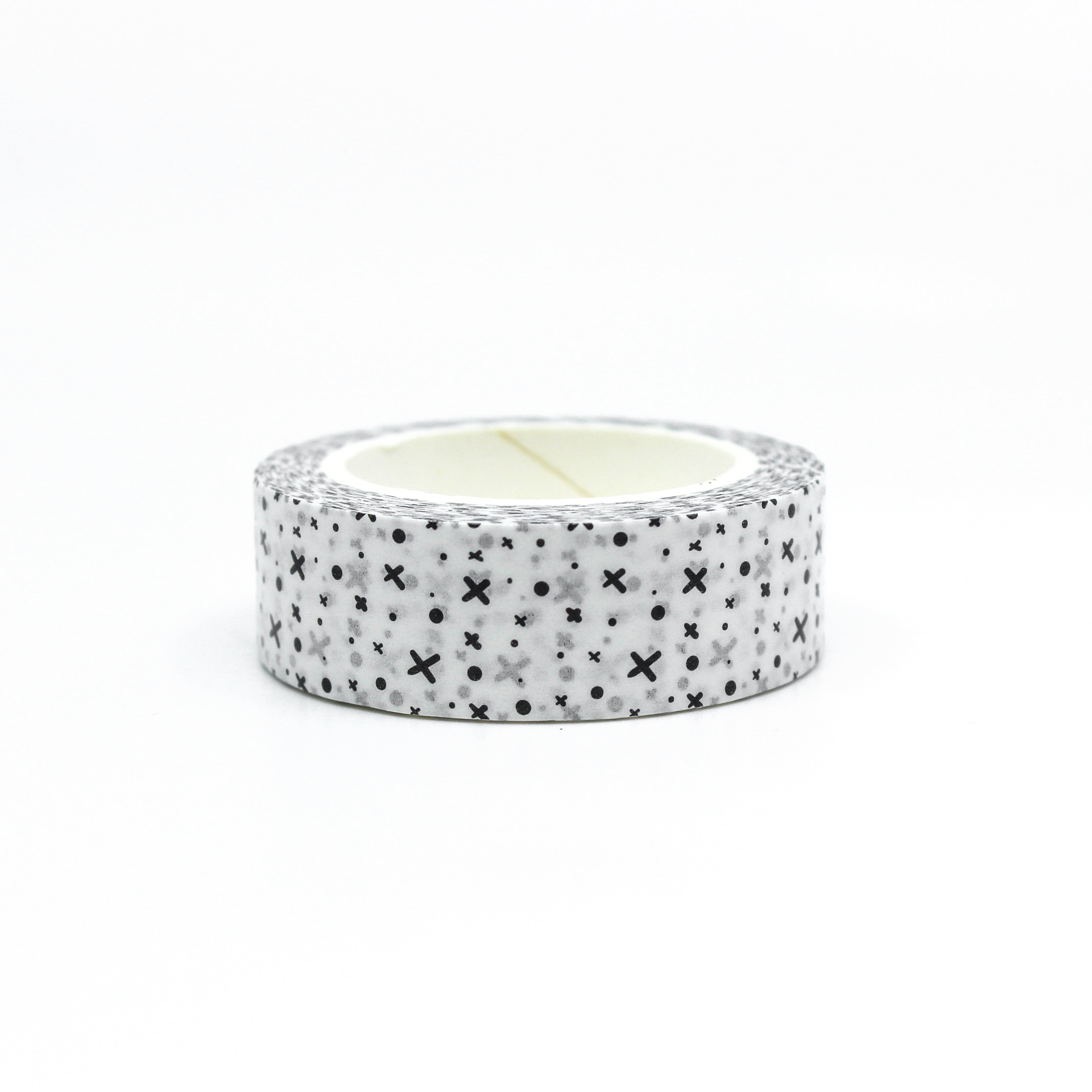 This photo is our black and white x's and dots graphic pattern washi tape roll. It is sold at BBB Supplies Craft Shop.