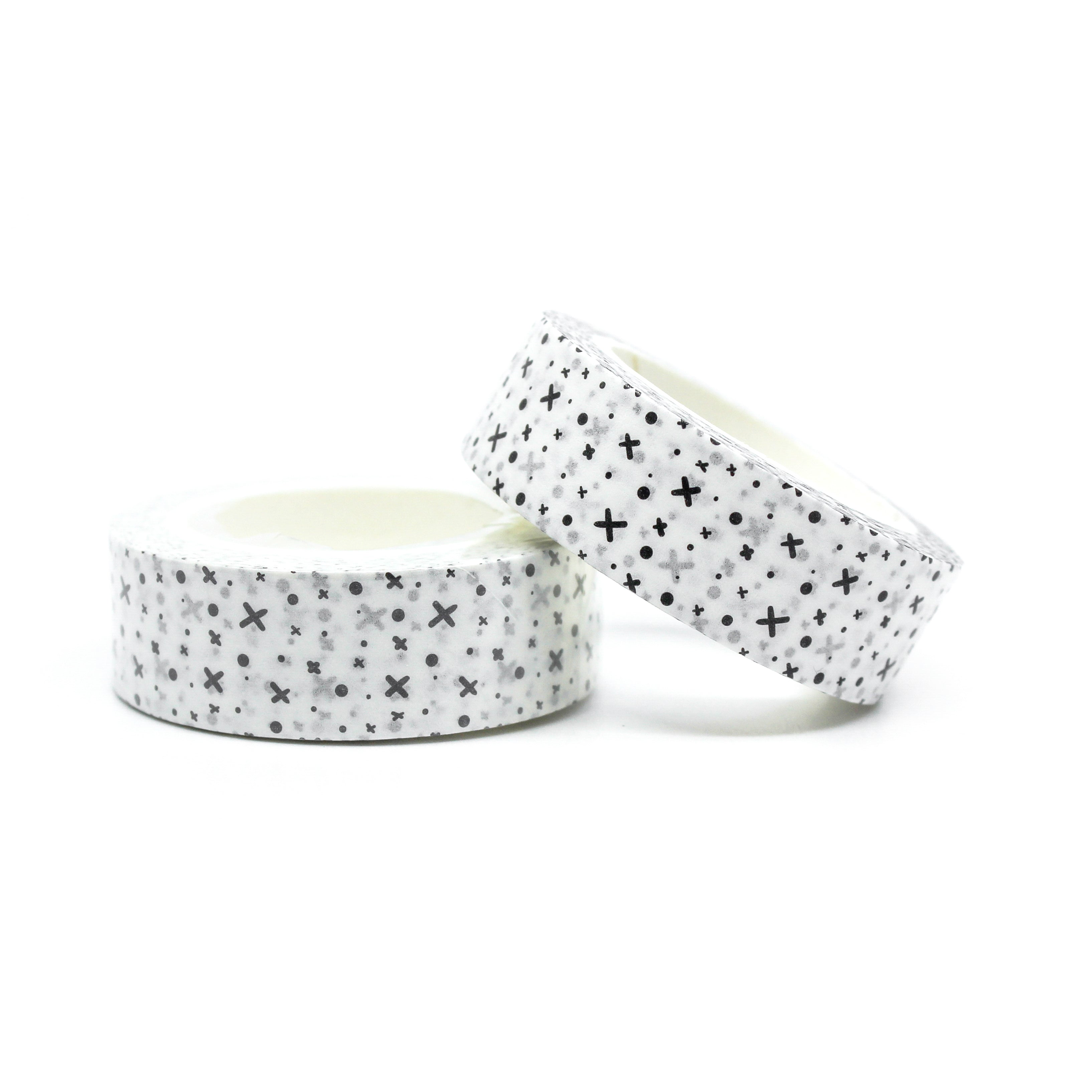 This photo is our black and white x's and dots graphic pattern washi tape roll. It is sold at BBB Supplies Craft Shop.