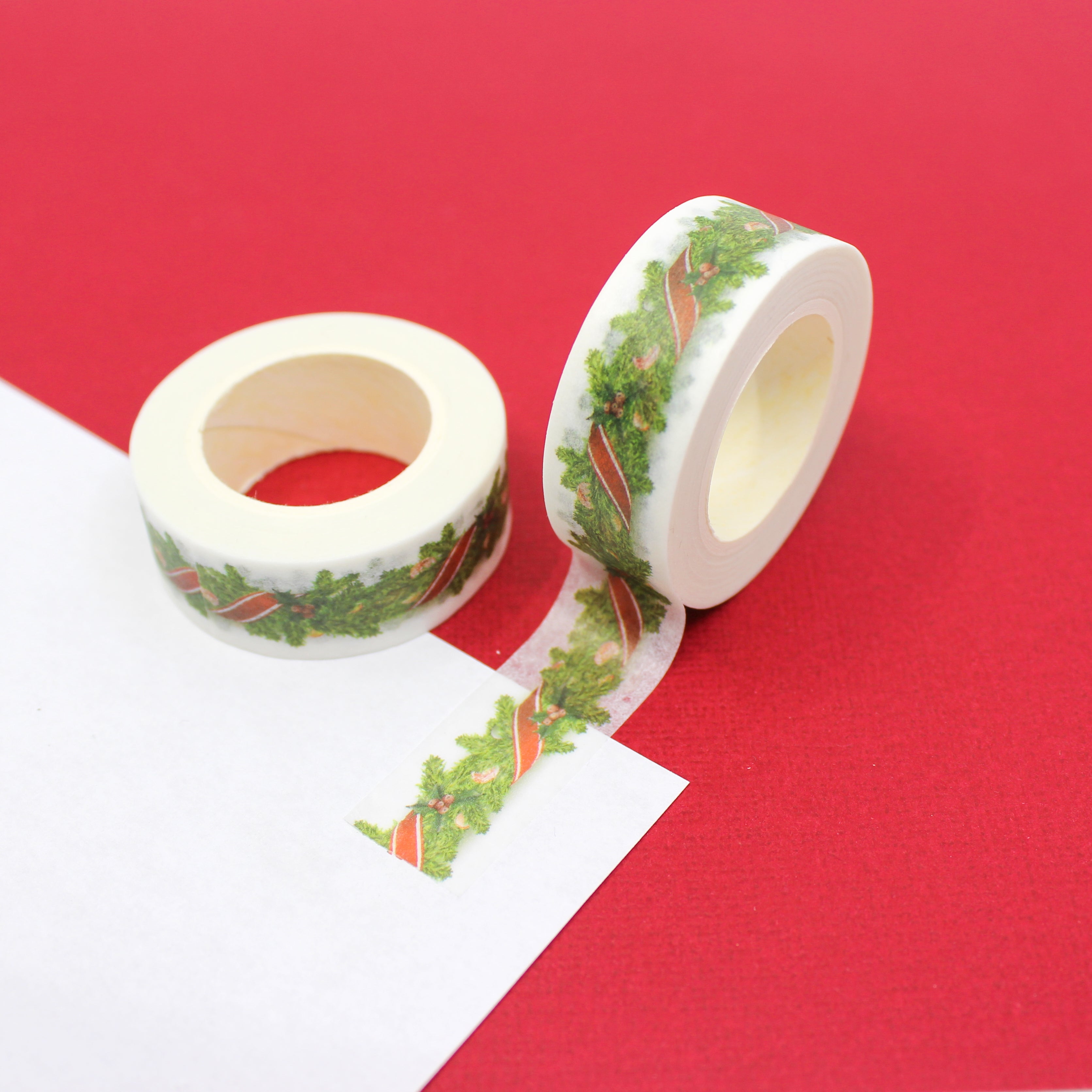 This is a Holiday greenery swag garland pattern washi tape from BBB Supplies Craft Shop