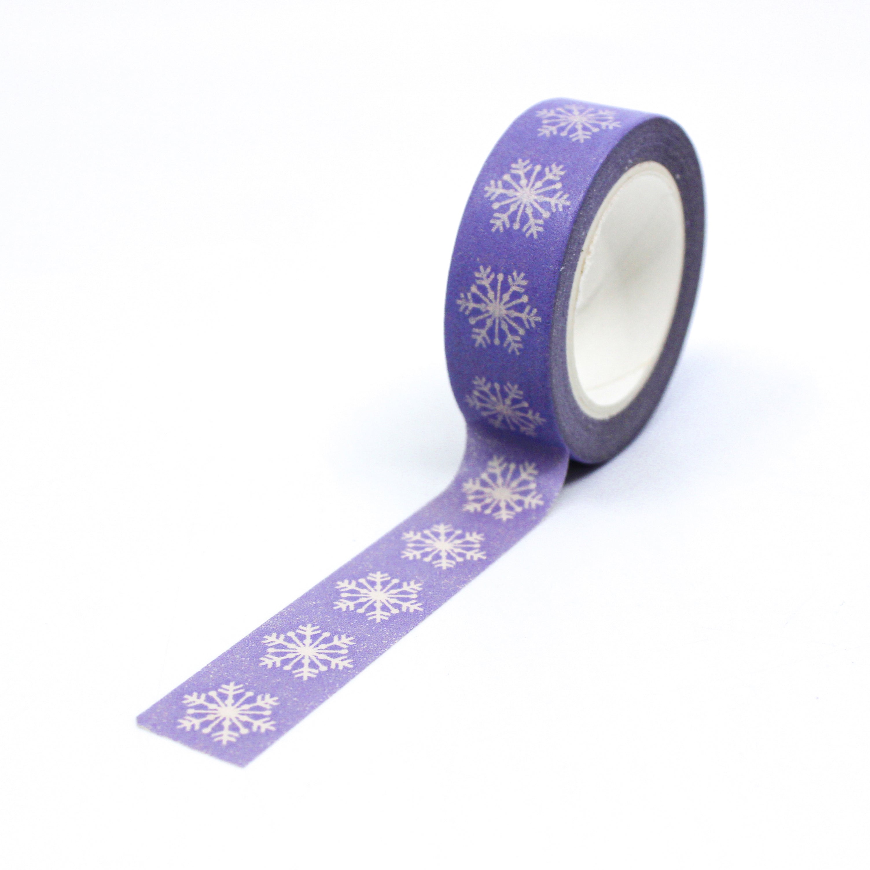 This photo is of our unique winter color of lavender purple snowflake, if you are looking for an option that is not traditional red and green for your Christmas projects. This tape is sold at BBB Supplies Craft Shop.