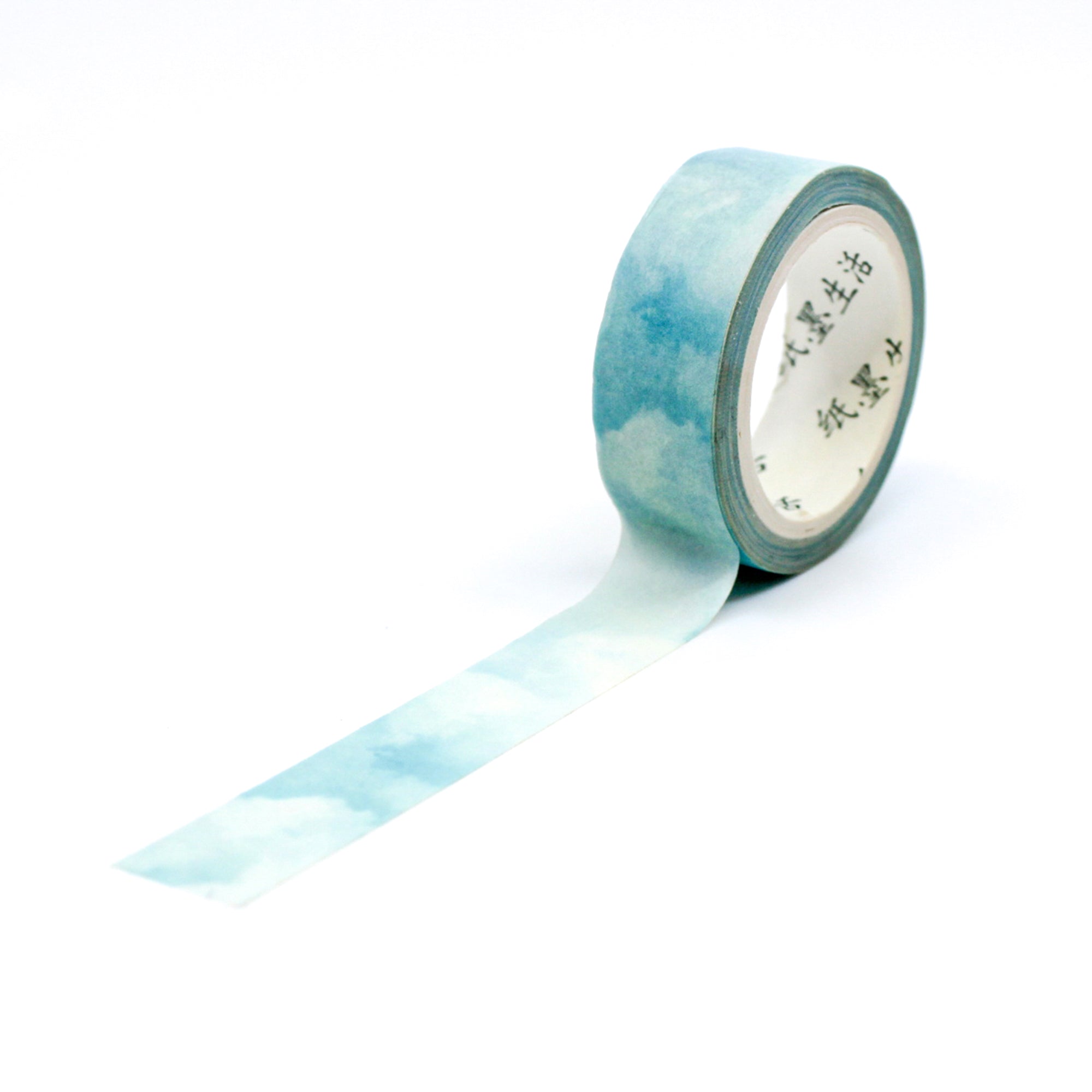 This blue clouds in the sky watercolor washi tape is the perfect addition to your washi collection. The simplicity of the pattern is perfect for accenting and matching any project's theme while adding a beautiful and interesting pattern. This tape is sold at BBB Supplies Craft Shop.