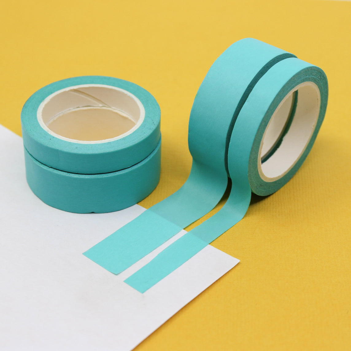 This pastel aqua blue washi tape is vibrant and fun. This washi tape is part of our solid neon thick-thin matching duo washi collection. Find the perfect color for any project in BBB Supplies' thick-thin solids collection, from neon to neutral to pastel and more.