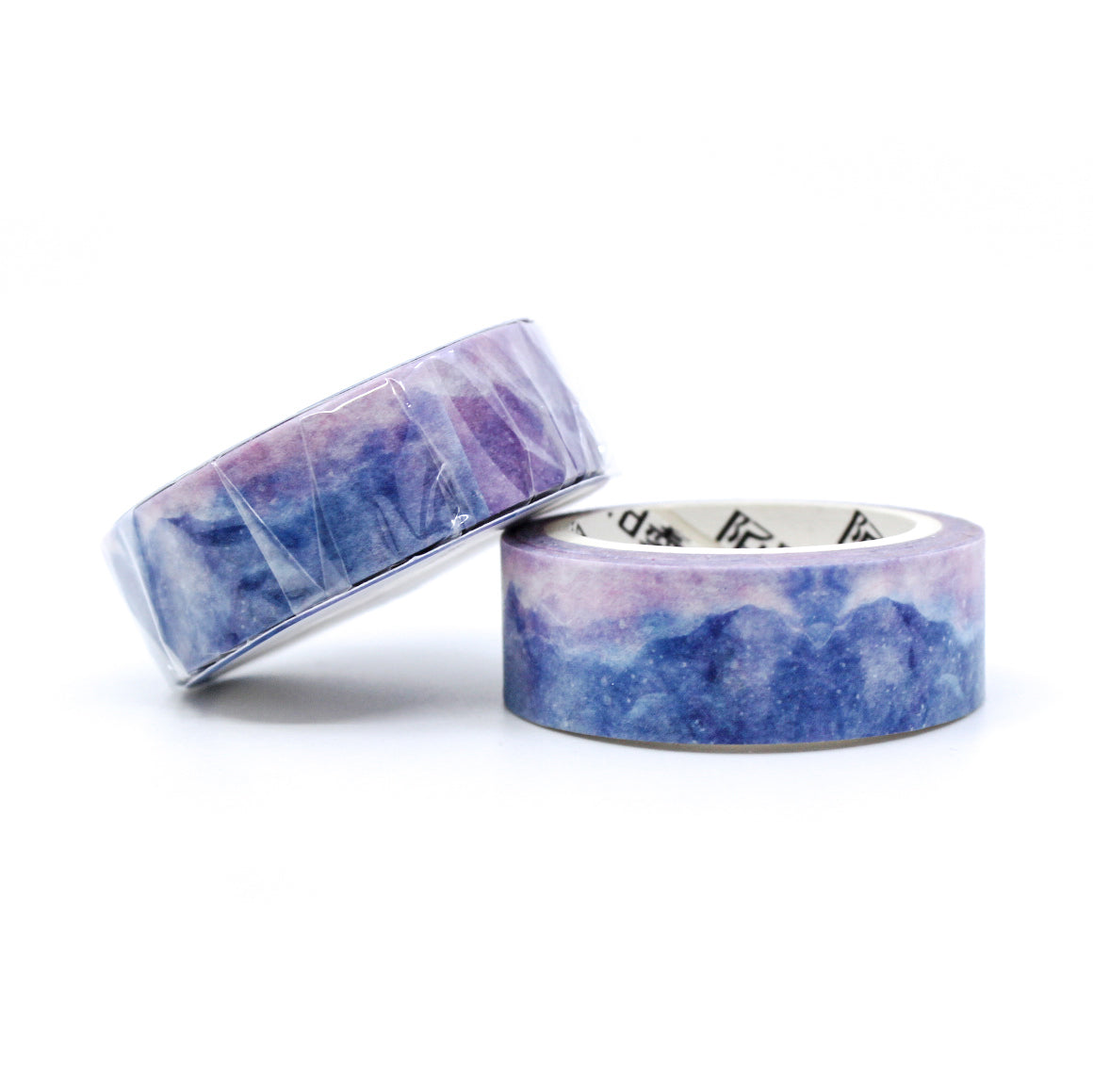 This purple crystal mountain watercolor washi tape is the perfect addition to your washi collection. This tape resembles a cloudy sky at sunrise. The simplicity of the pattern is perfect for accenting and matching any project's theme while adding a beautiful and interesting pattern. This tape is from BBB Supplies Craft Shop.