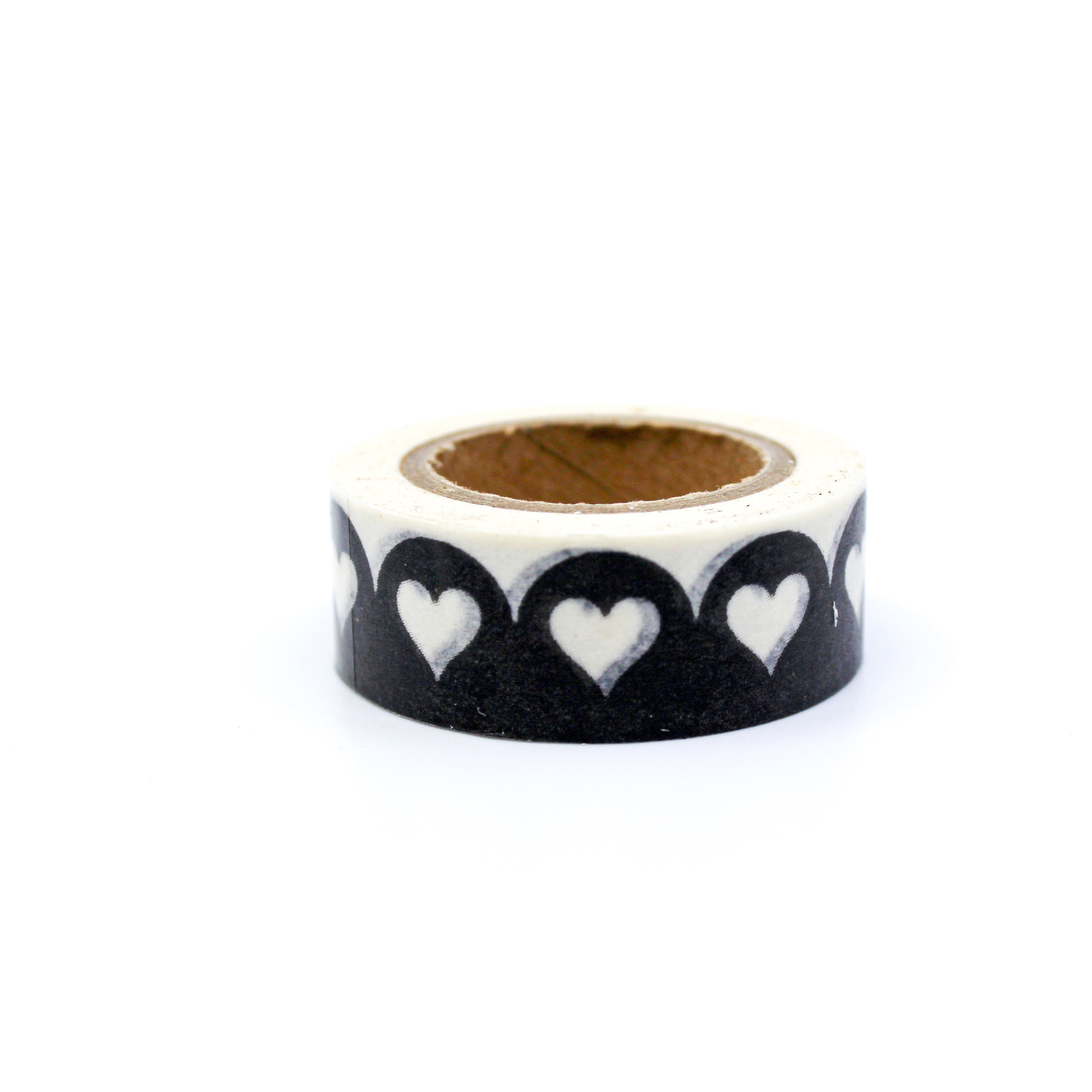 This is a black scallop edge and white hearts pattern washi tape from BBB Supplies Craft Shop