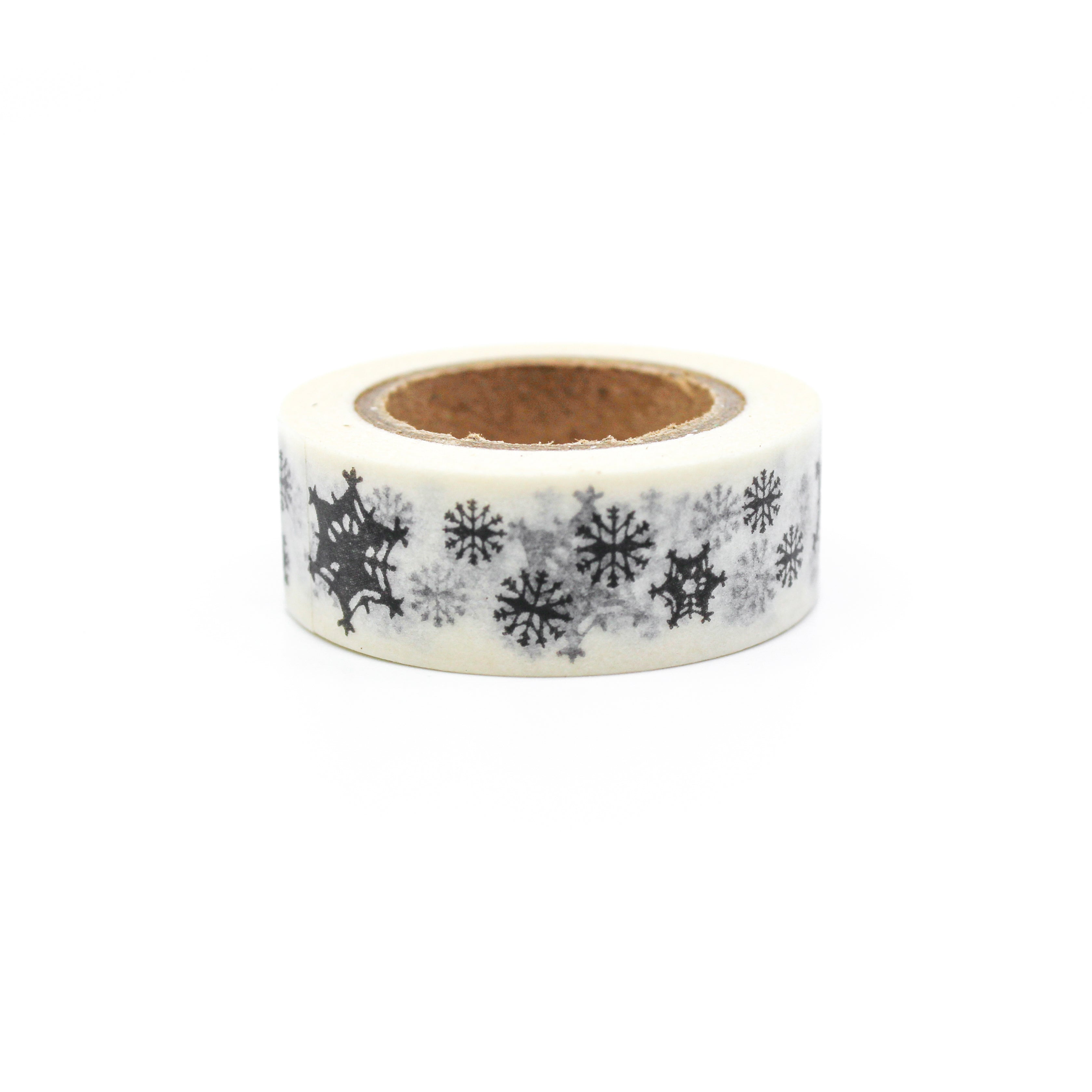 This is a black snowflakes in a white background washi tape from BBB Supplies Craft Shop