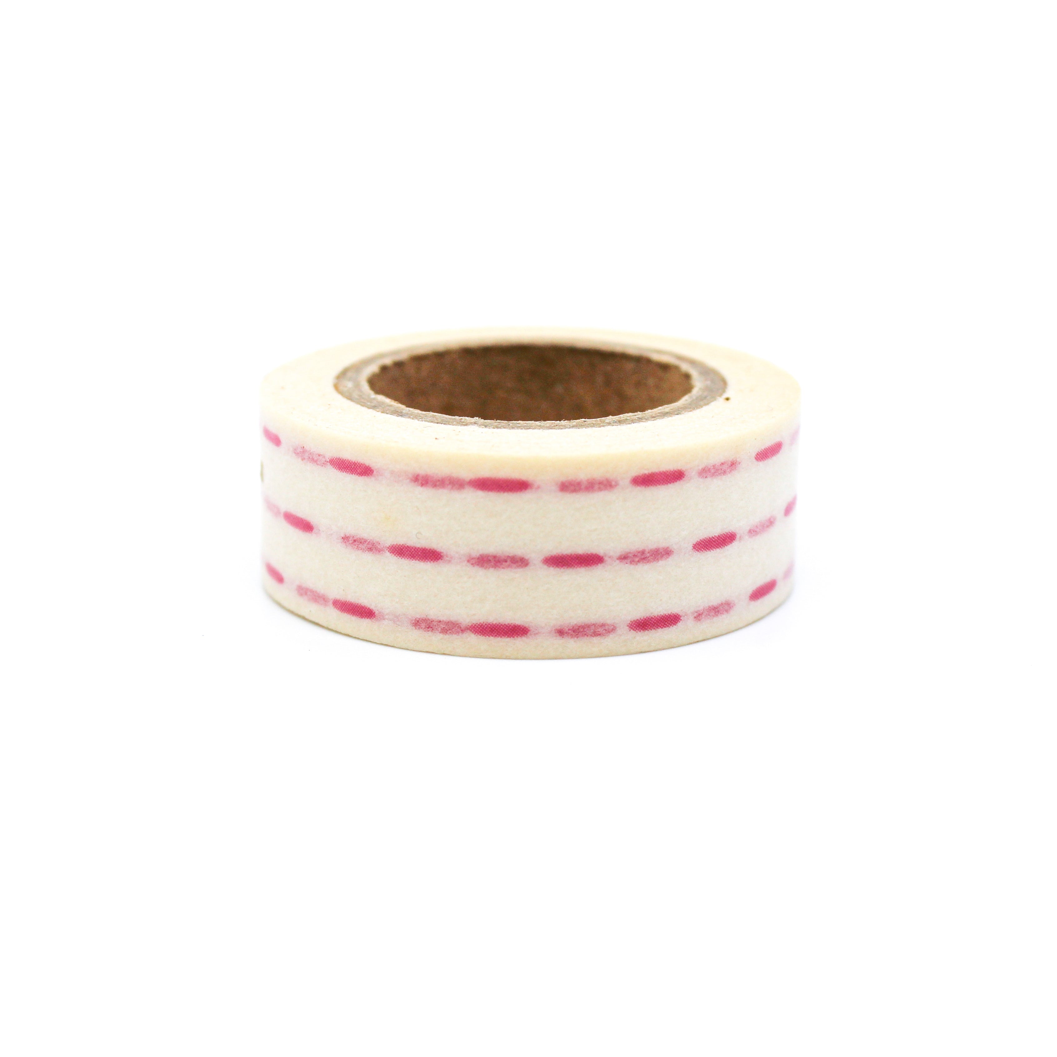 This is a pink dashed lines or dots with white background washi tape from BBB Supplies Craft Shop