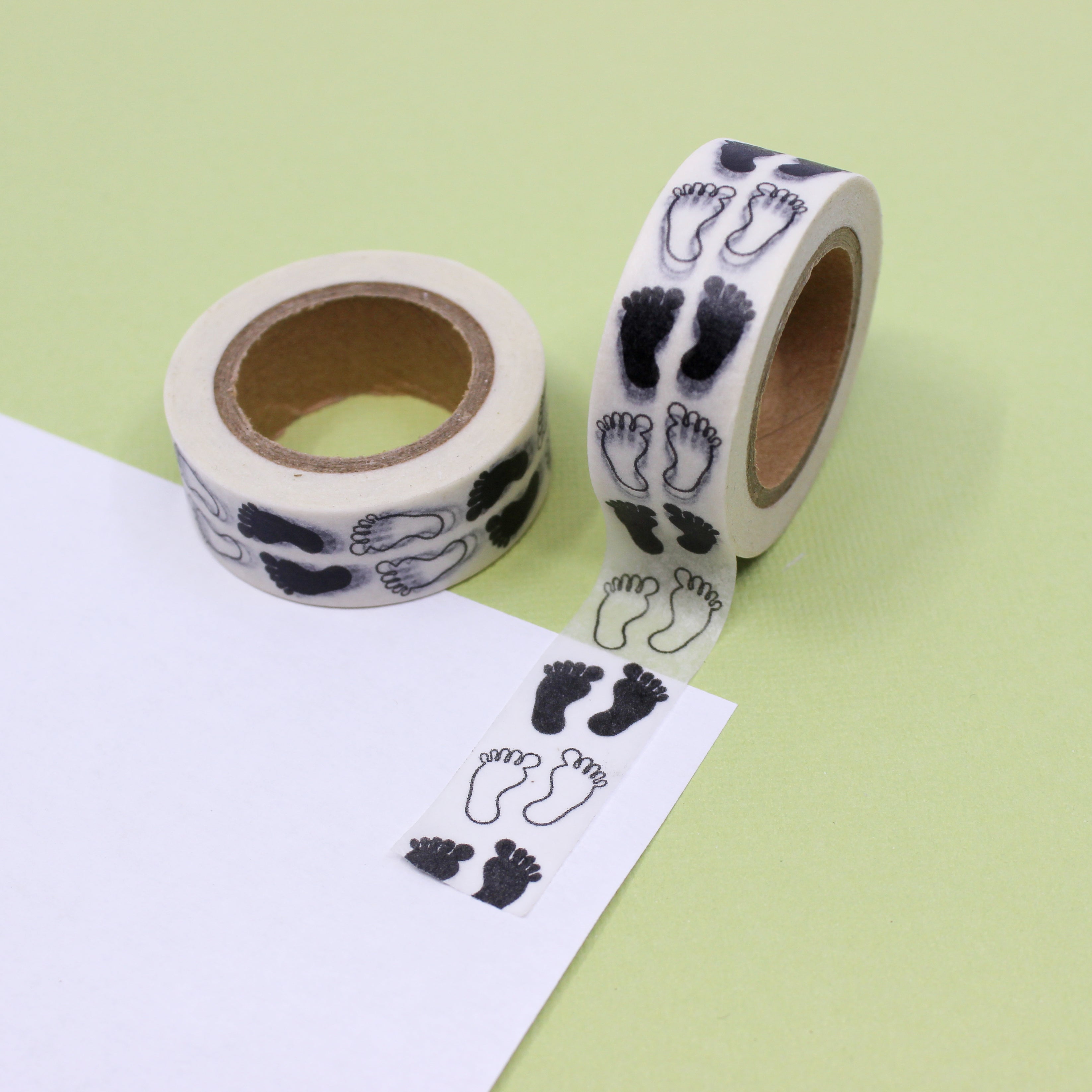 This is a black and white foot prints view themed washi tape from BBB Supplies Craft Shop