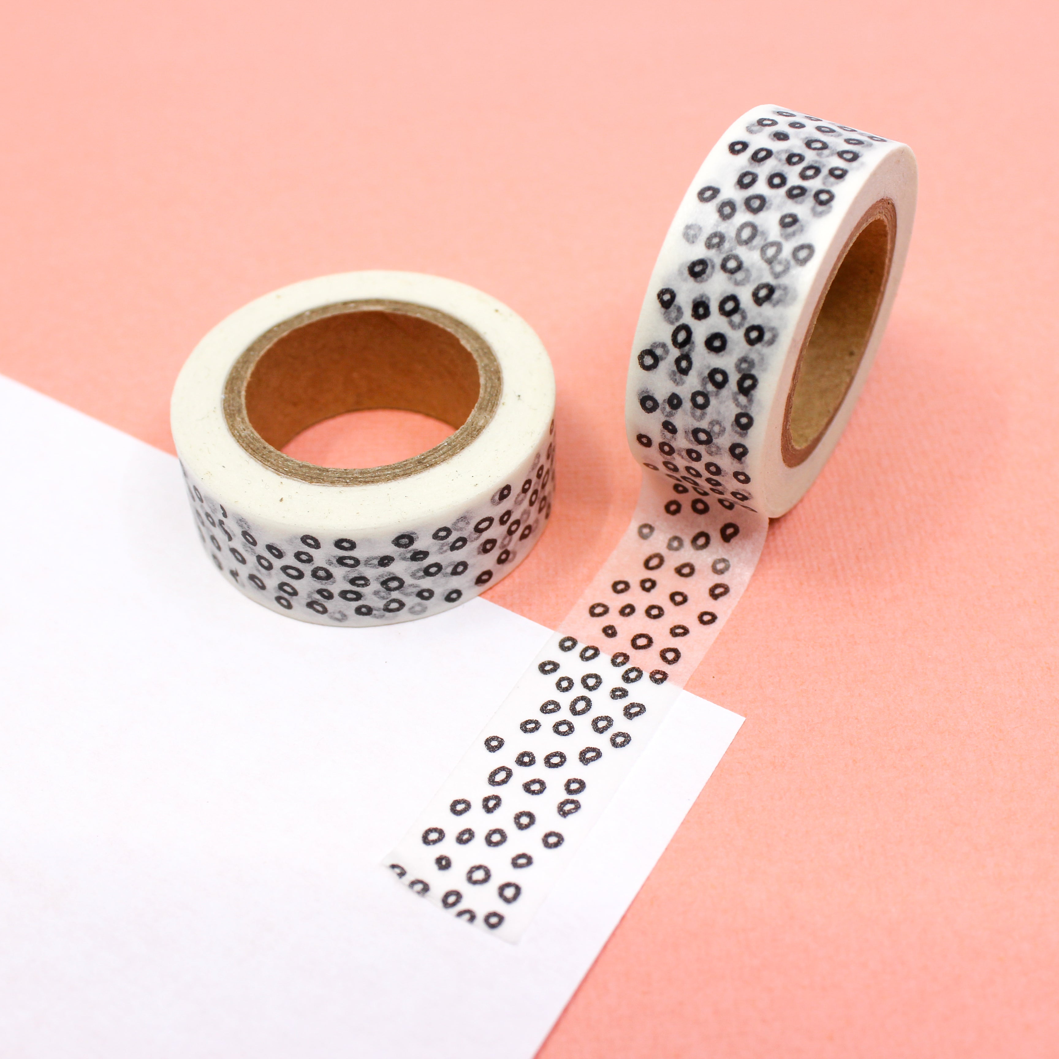 This is a black spots of leopard print animal pattern washi tape from BBB Supplies Craft Shop