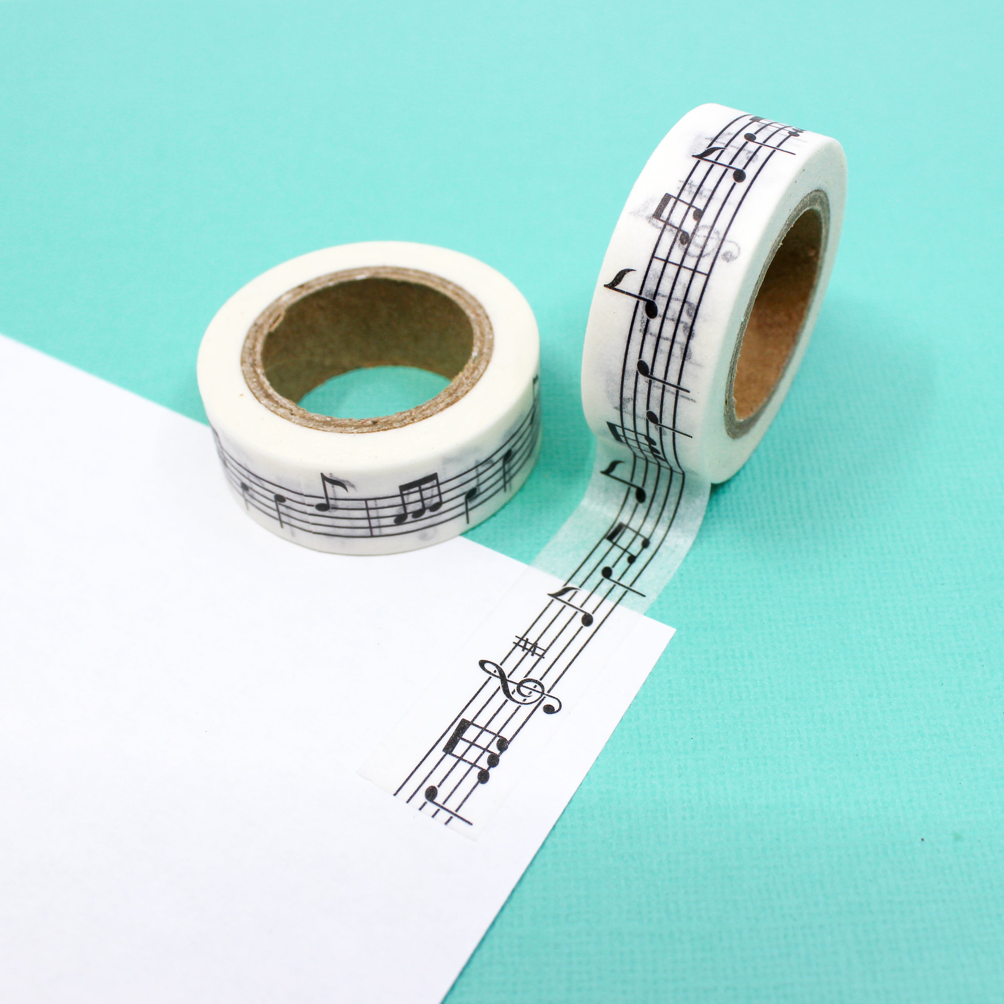 This is a black and white musical notes pattern Washi Tape from BBB Supplies Craft Shop