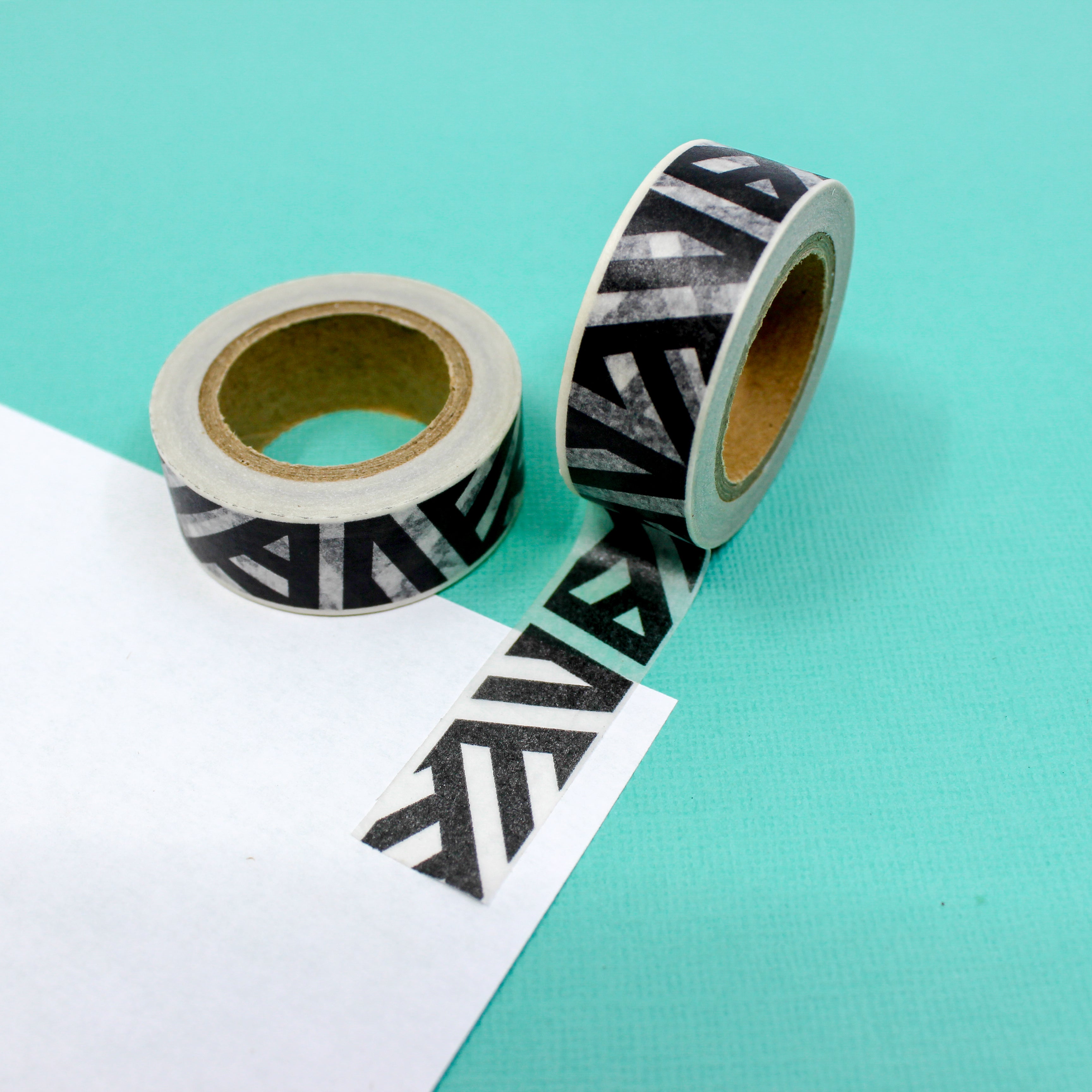 This is a black and white woven stripes pattern Washi Tape from BBB Supplies Craft Shop