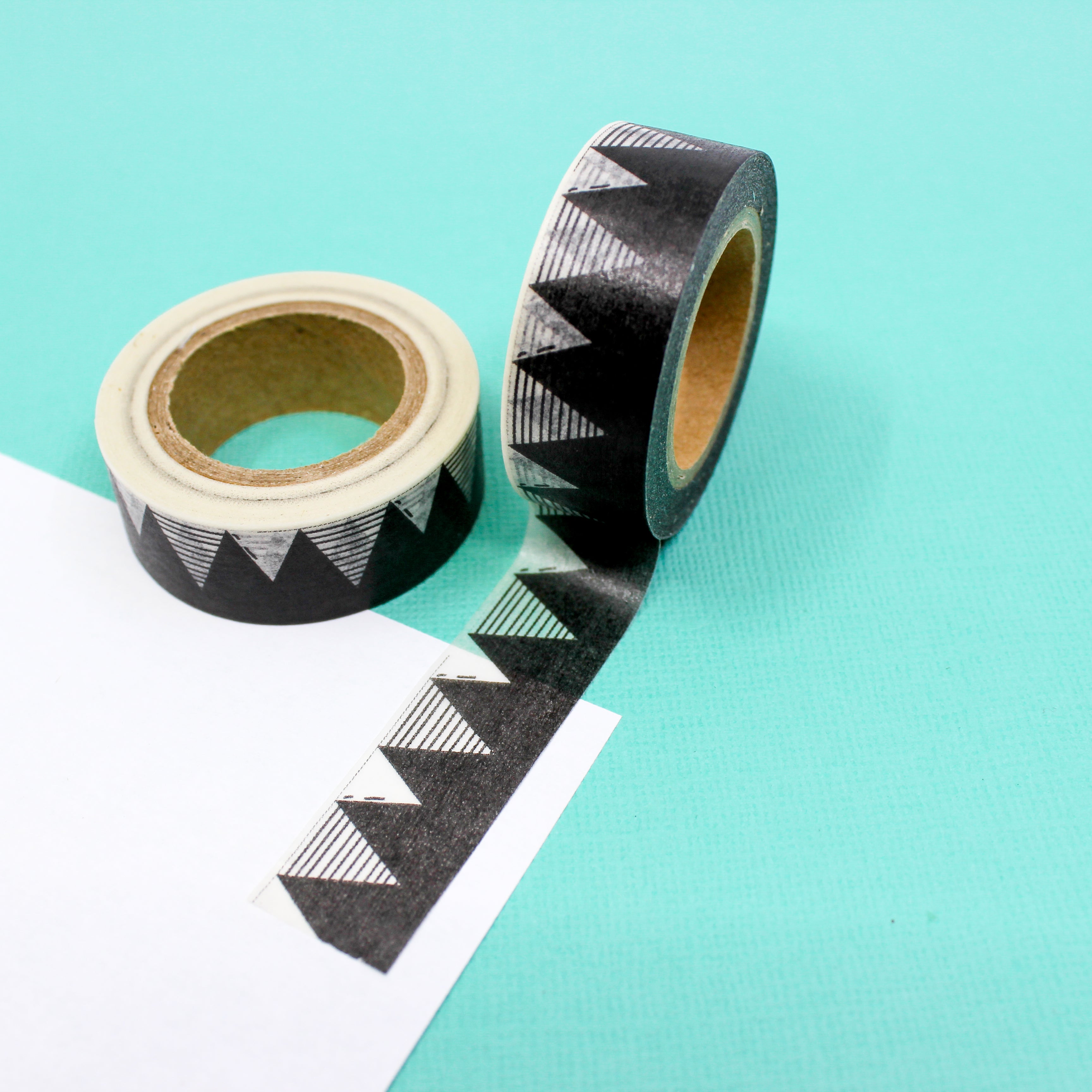 This is a black and white triangle mountain pattern Washi Tape from BBB Supplies Craft Shop