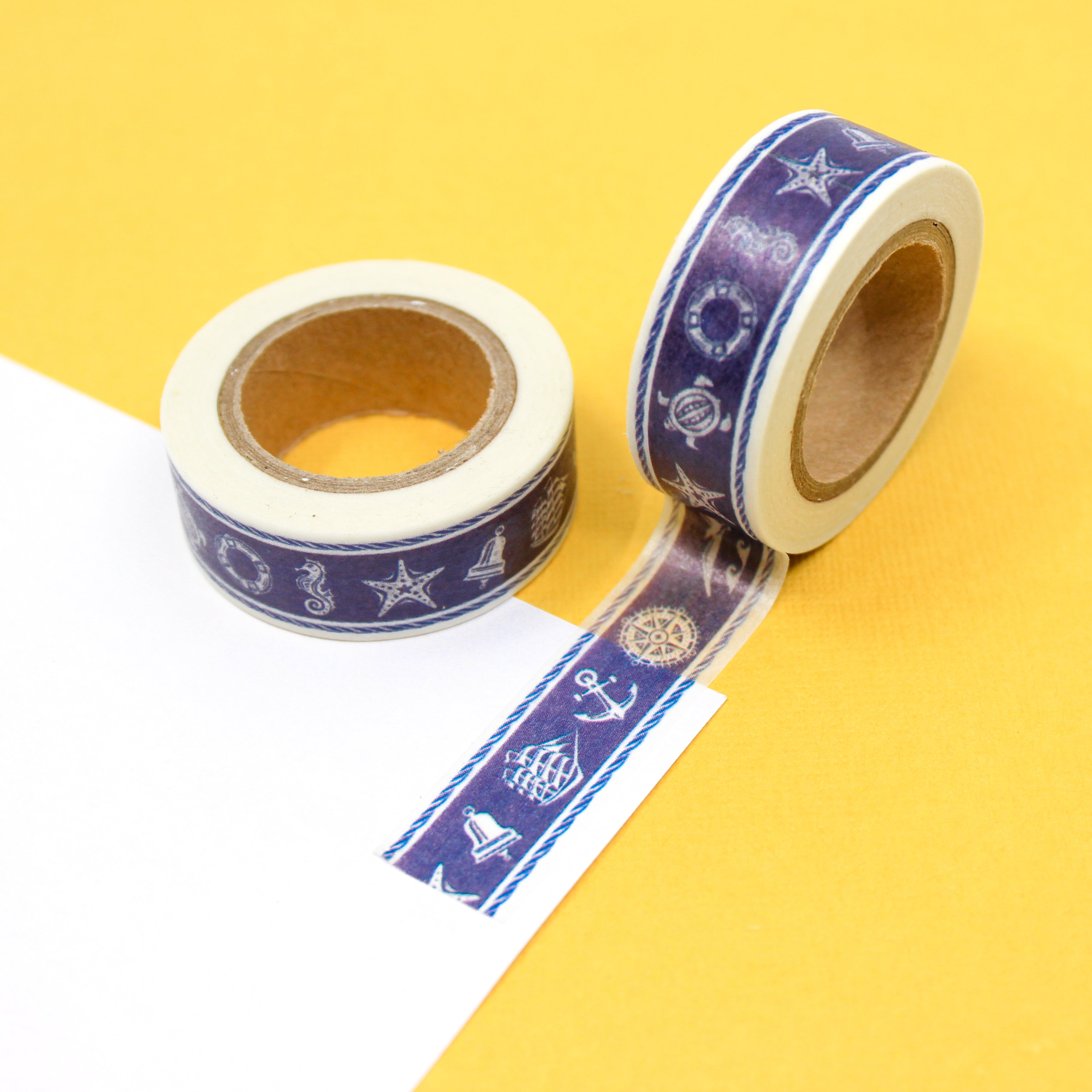 This is a navy blue nautical symbols and sea life patterns view themed washi tape from BBB Supplies Craft Shop