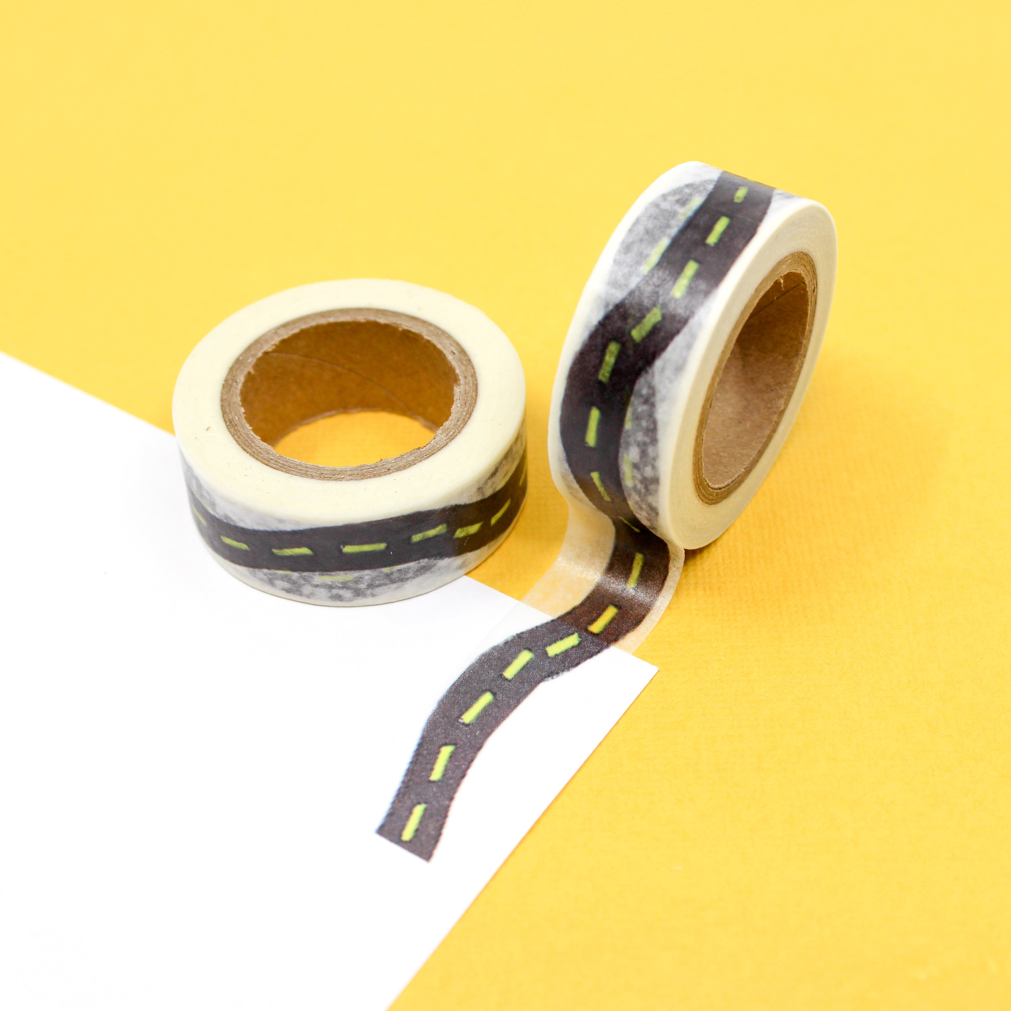 This is a black swervy roads with yellow dotted lines in the middle pattern Washi Tape from BBB Supplies Craft Shop