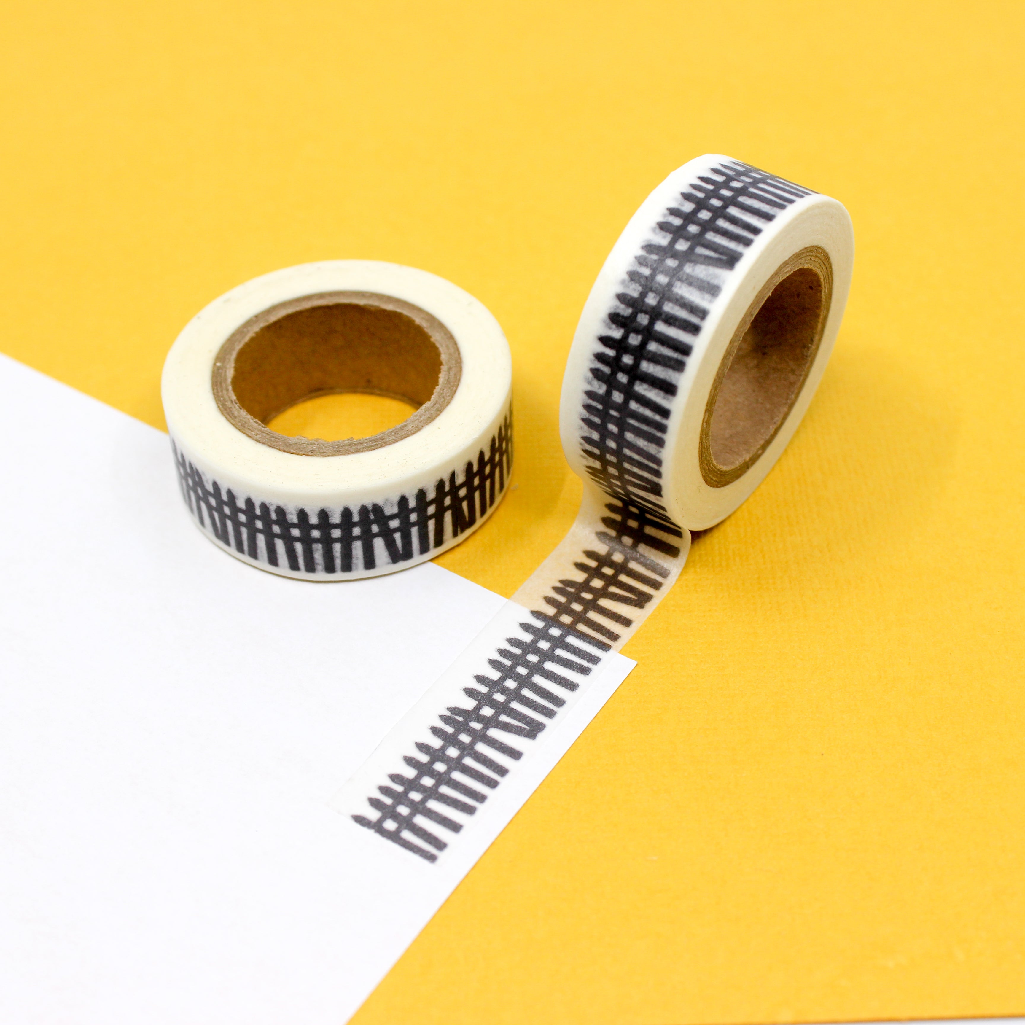 This is a black and white picket fence pattern Washi Tape from BBB Supplies Craft Shop