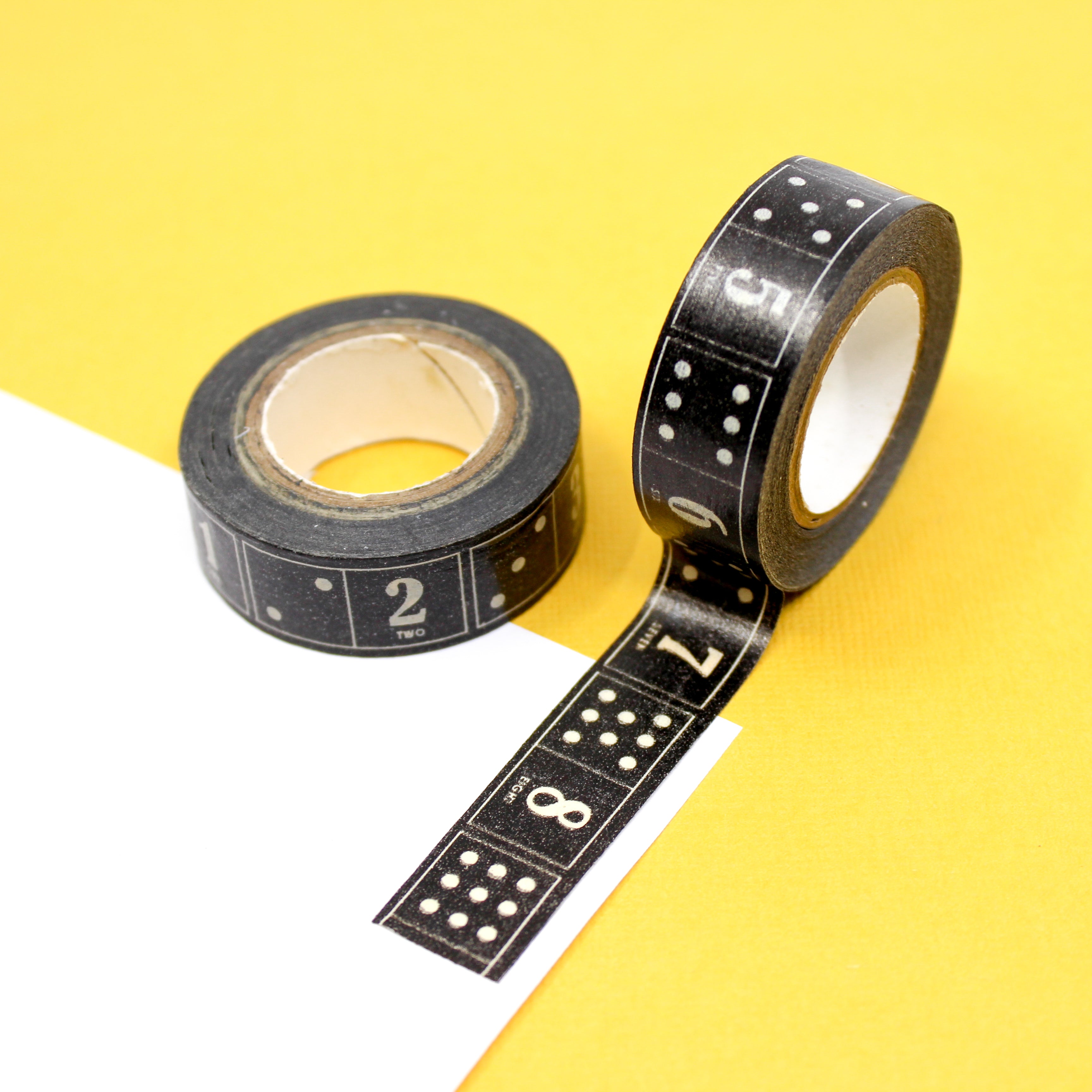 This is a black domino with different white dots design pattern Washi Tape from BBB Supplies Craft Shop