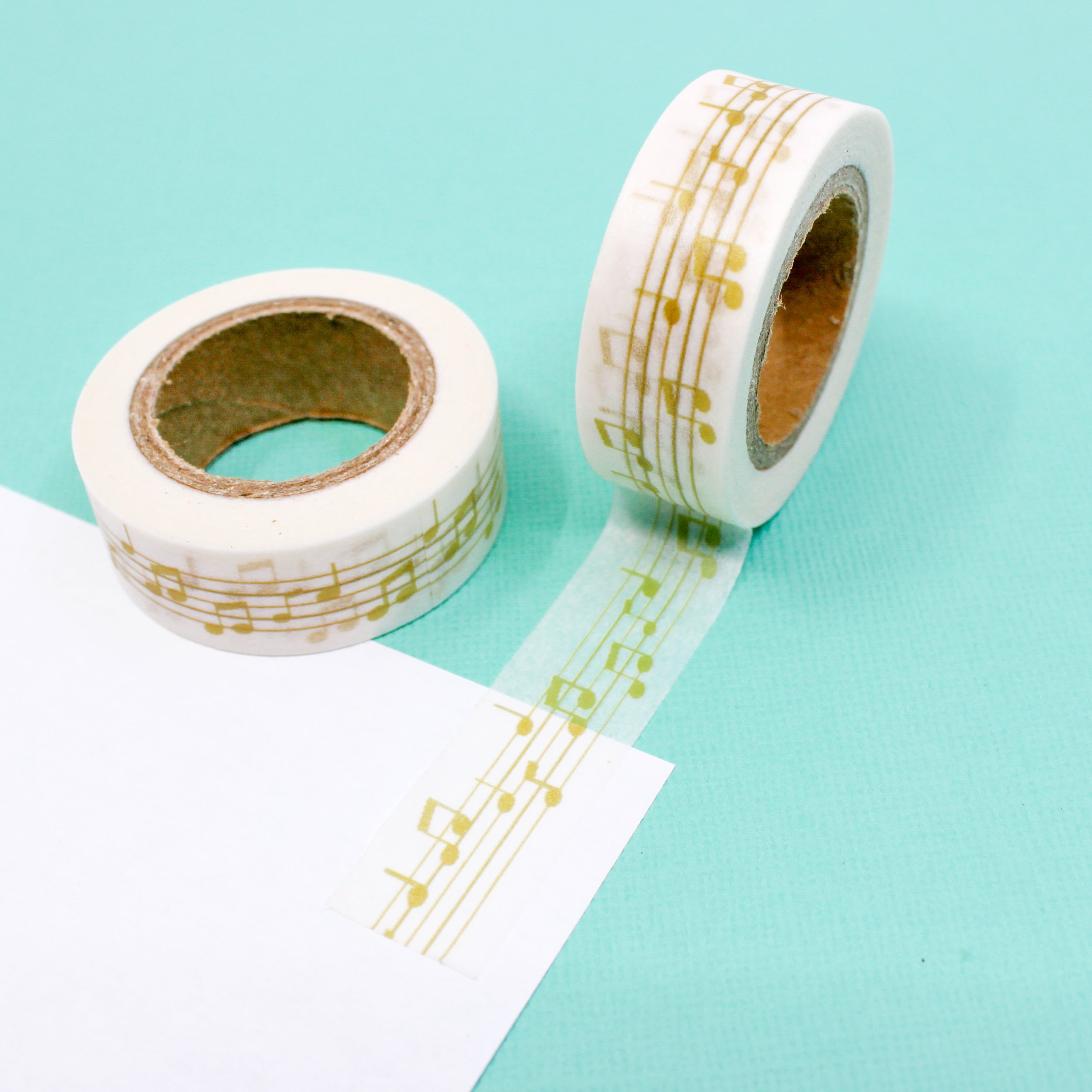This is a yellow music notes pattern washi tape from BBB Supplies Craft Shop