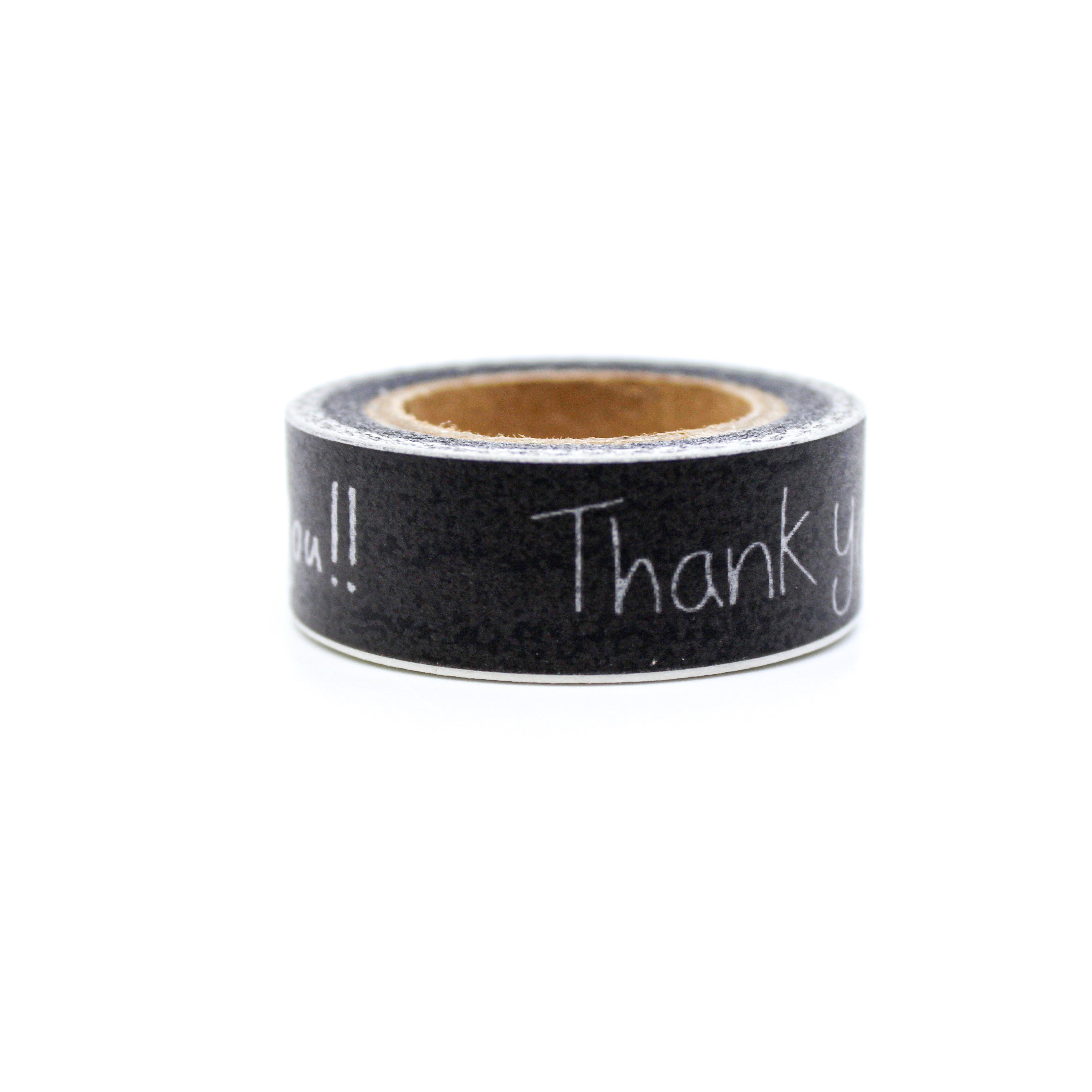 This is a white handwritten thank you phrase in a black background washi tape from BBB Supplies Craft Shop