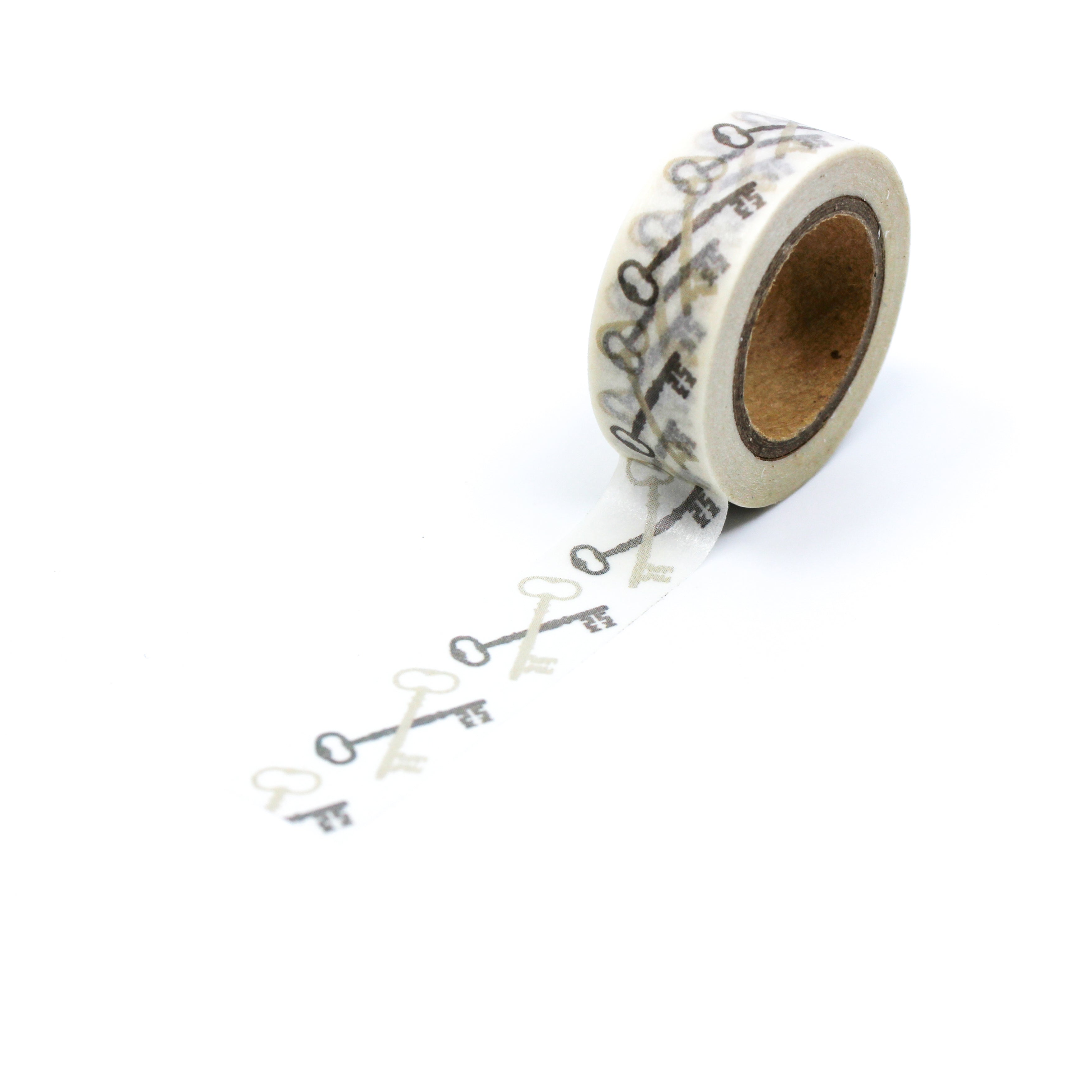 This is a full pattern repeat view of crossed gold keys washi tape from BBB Supplies Craft Shop
