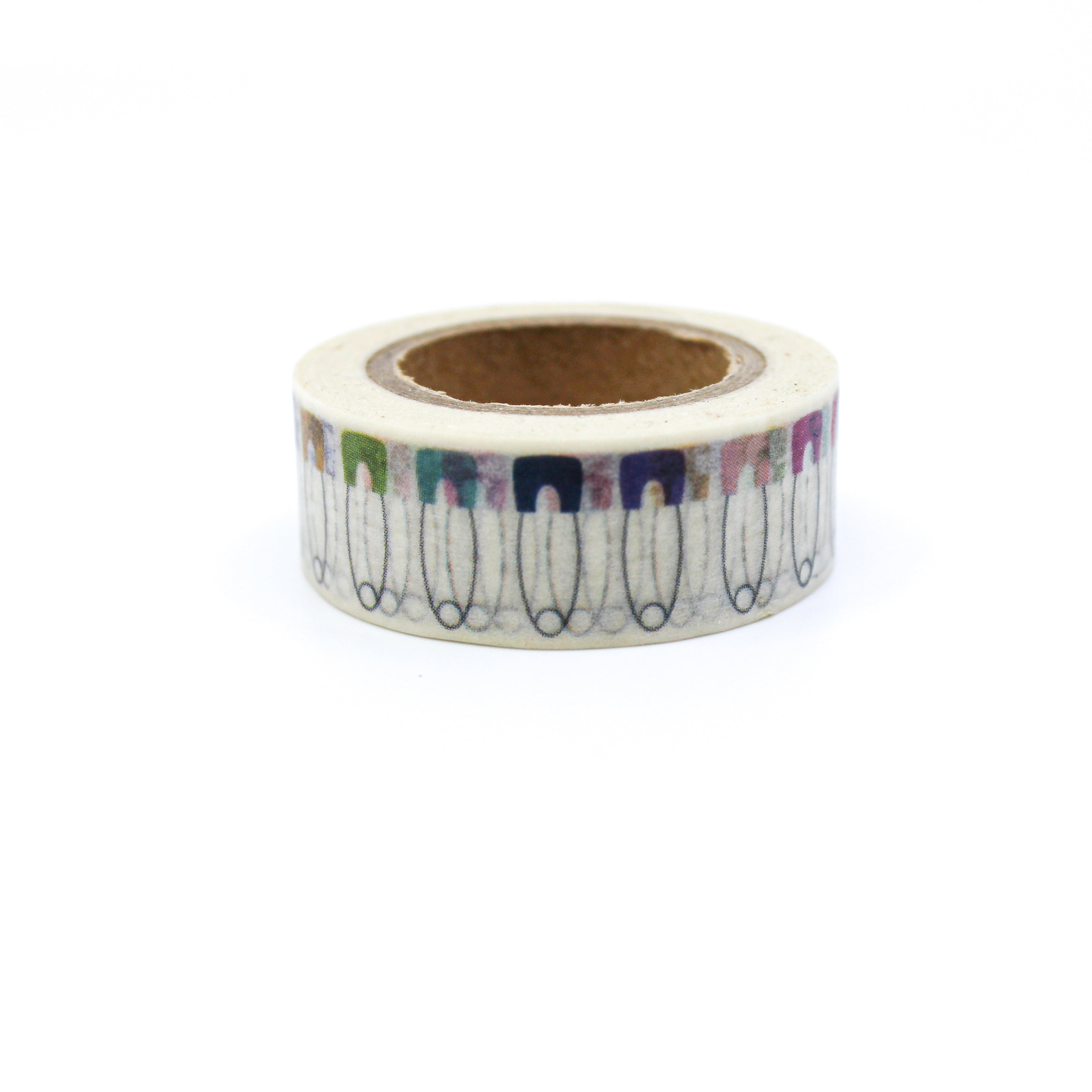 This is a cute collection of baby clothes pins a white background washi tape from BBB Supplies Craft Shop