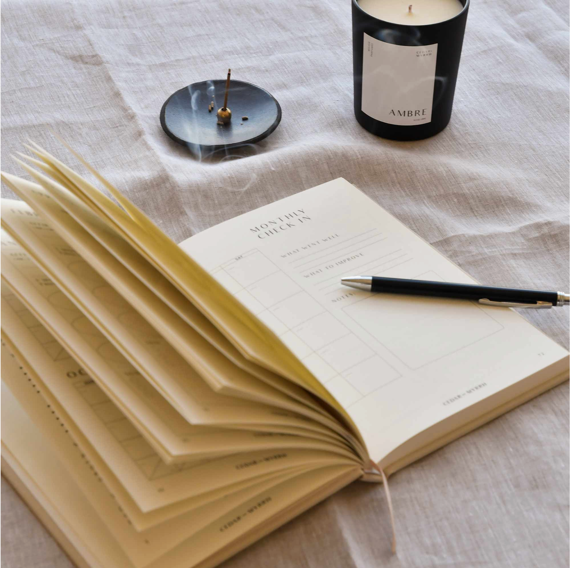 Living with Intent Journal featuring guided prompts for mindfulness, self-reflection, goal-setting, and daily habit tracking for a purposeful and intentional life.