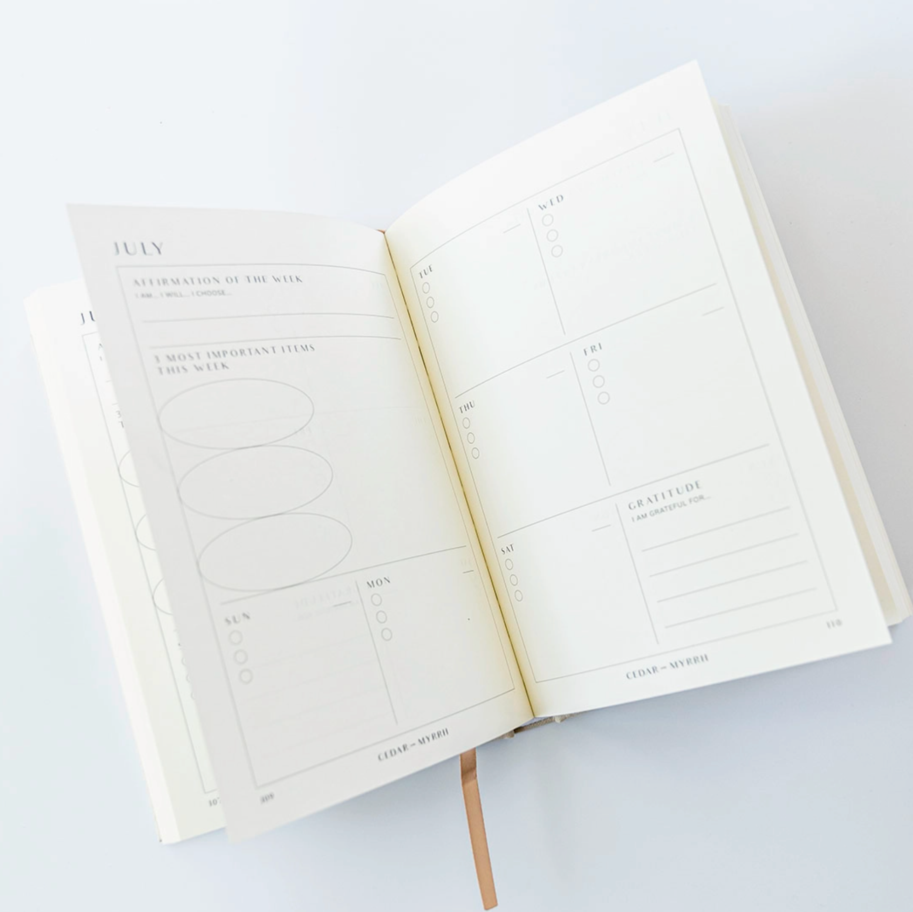 Living with Intent Journal featuring guided prompts for mindfulness, self-reflection, goal-setting, and daily habit tracking for a purposeful and intentional life.