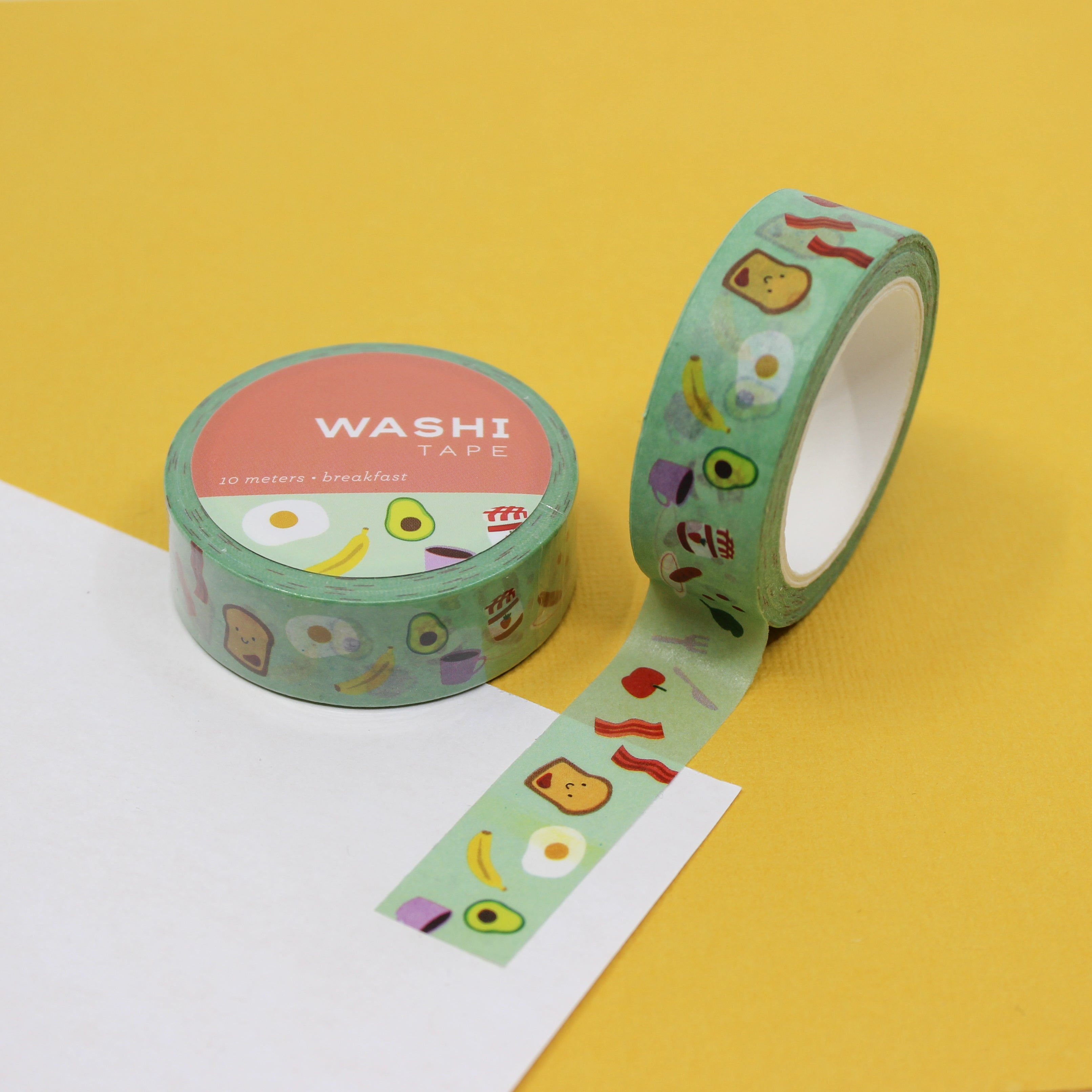 Start your crafting day right with our Breakfast Food Washi Tape, featuring a tasty array of breakfast items. Perfect for adding a delicious and whimsical touch to your projects. This tape is designed by Girl of All Work and sold at BBB Supplies Craft Shop.