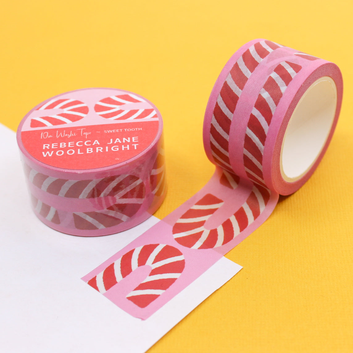 Sweet Tooth Candy Cane Washi Tape showcasing delightful candy canes in a whimsical pattern, adding a sugary and festive flair to your crafting or holiday-themed projects. This tape is from Rebecca Jane Woolbright and sold at BBB Supplies Craft Shop.