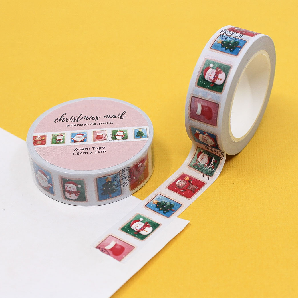 Holiday washi tape with postmarks and Christmas icons for journaling