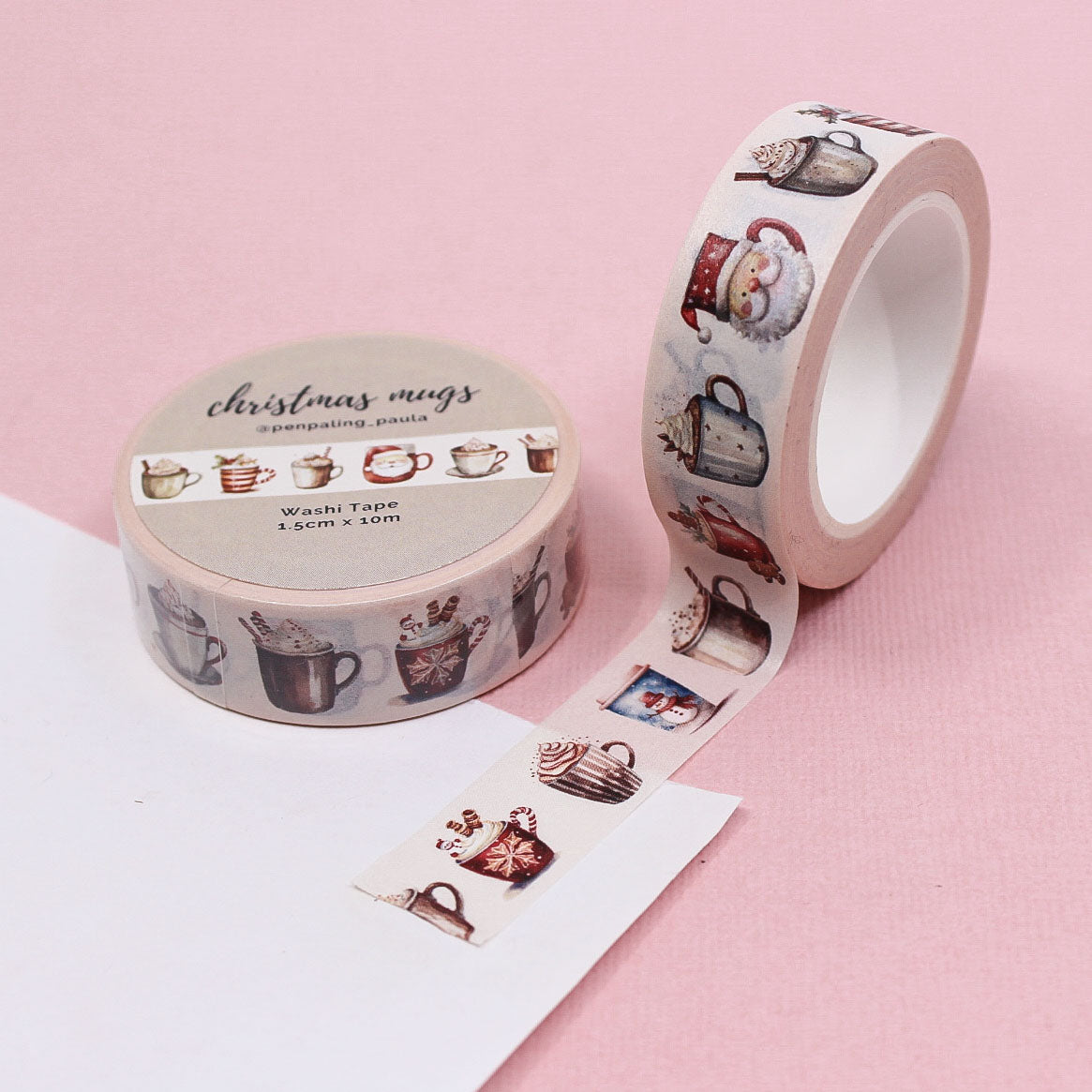 Holiday-themed washi tape with cheerful mug illustrations