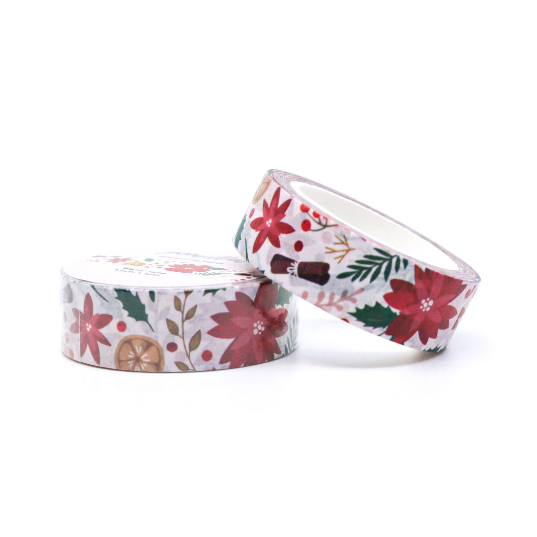 Festive washi tape with poinsettias and winter leaves on a red background, perfect for planners and Bujo spreads.
