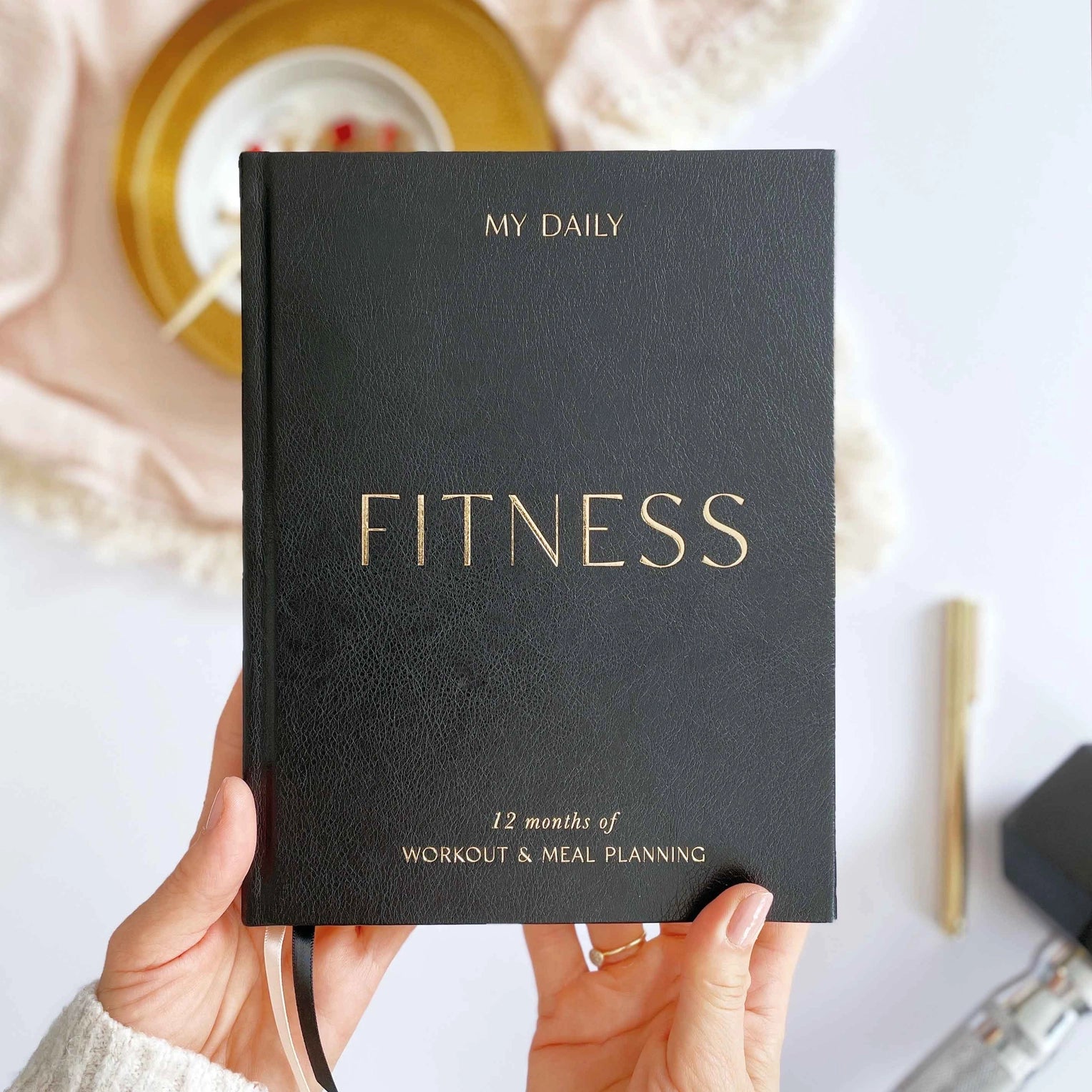 Stay on top of your fitness goals with this comprehensive planner. Track your workouts, plan your meals, and monitor your progress all in one convenient place. This Planner is from Blush and Gold and sold at BBB Supplies Craft Shop. 