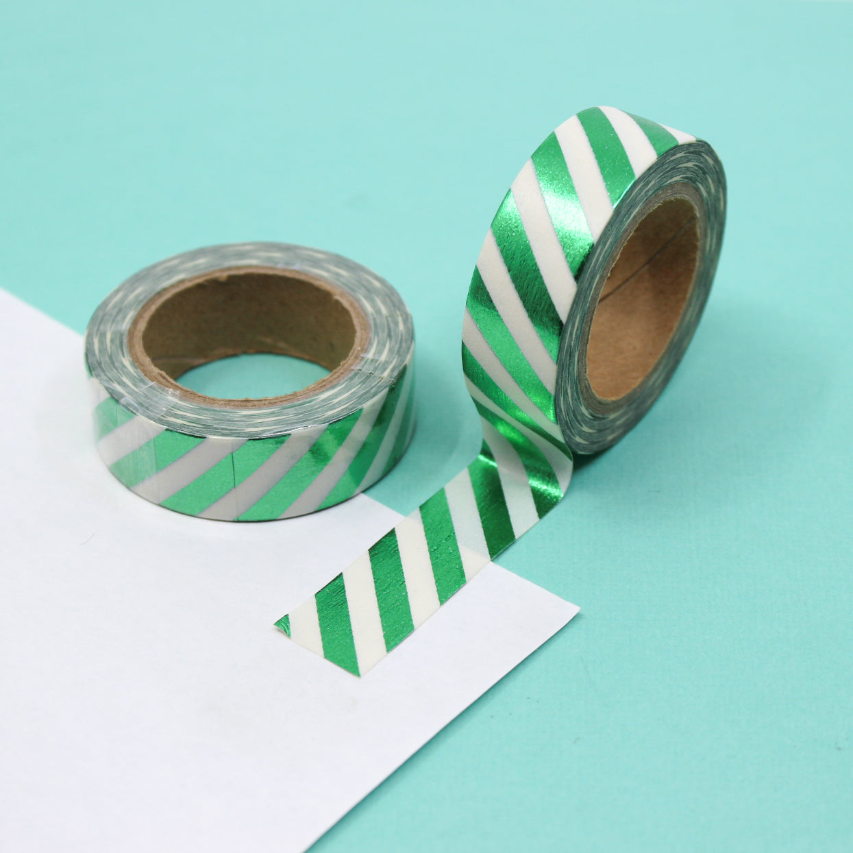 Add a touch of sophistication to your crafts with our diagonal stripe foil washi tape, featuring sleek diagonal stripes in shimmering foil, perfect for creating elegant and eye-catching accents. This tape is sold at BBB Supplies Craft Shop.