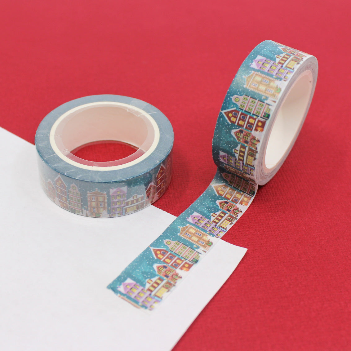 Add a whimsical touch to your holiday crafts with this delightful washi tape featuring a charming Santa's village design. Perfect for decorating cards, gift wrap, and more, this tape is sure to spread holiday cheer! This tape is sold at BBB Supplies Craft Shop.