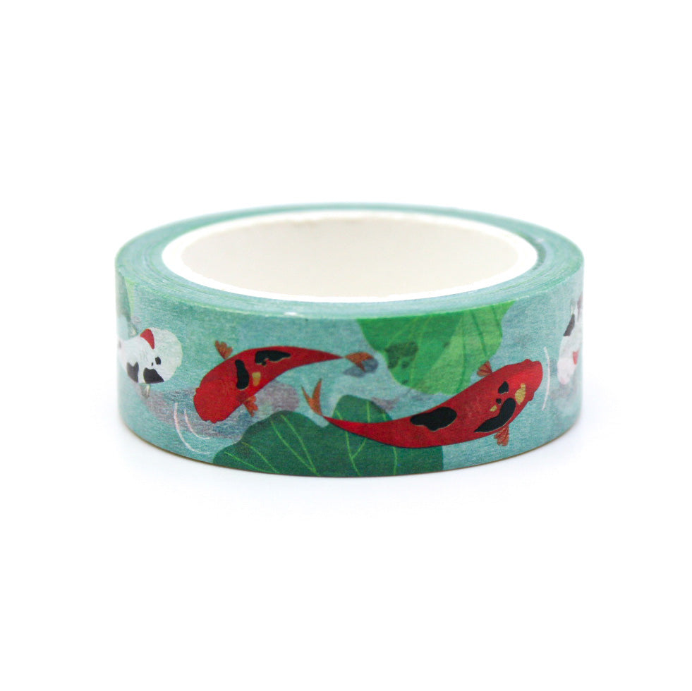 Koi Fish Washi Tape, featuring vibrant and graceful koi swimming in a watercolor-inspired aquatic scene, adding a touch of elegance and serenity to your creative projects. This tape is from Girl of All Work aned Sold at BBB Supplies Craft Shop.