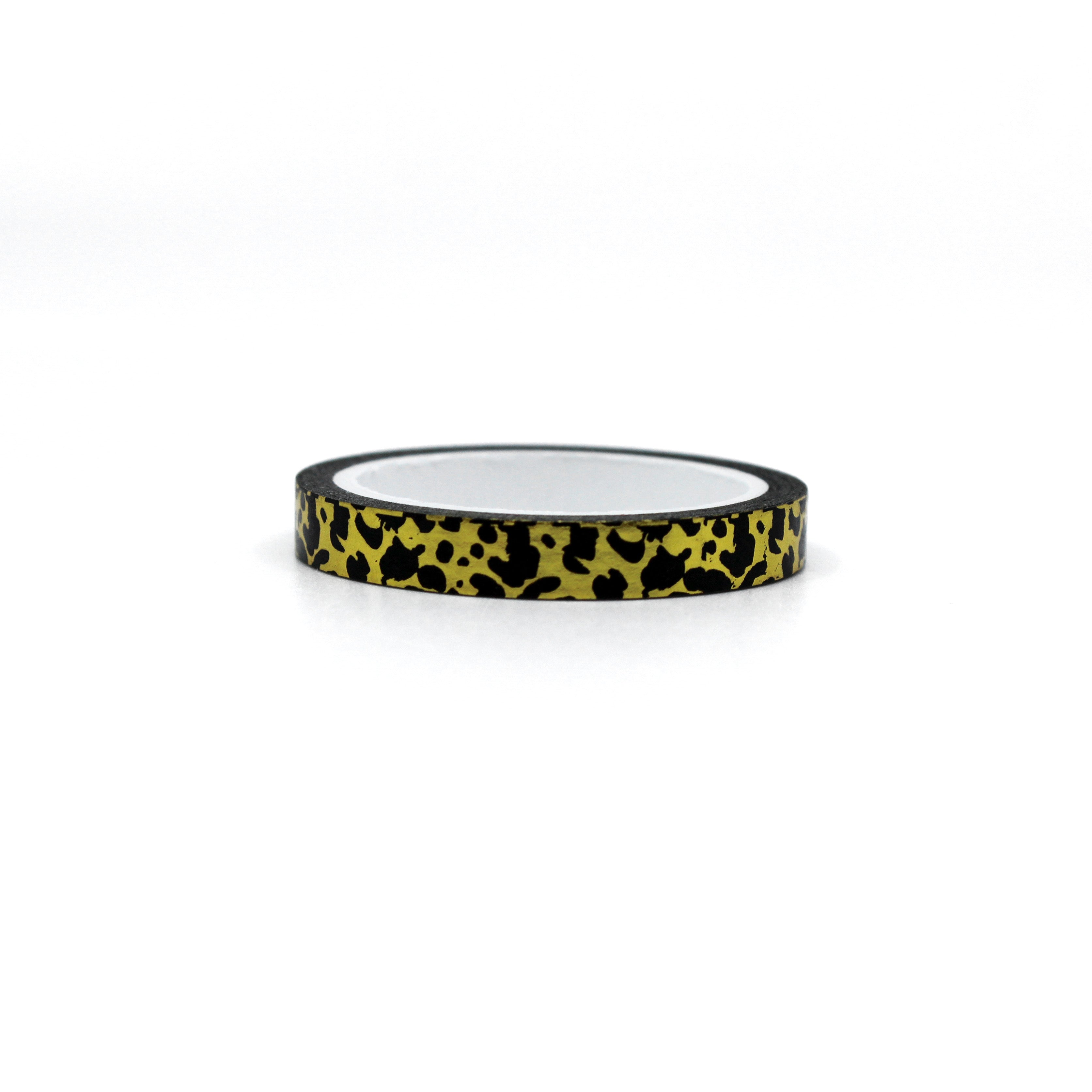 Elevate your crafts with our gold foil narrow leopard print washi tape, featuring a sleek and luxurious leopard print design accented with shimmering gold foil, perfect for adding a touch of wild elegance to your projects. This tape is sold at BBB Supplies Craft Shop.