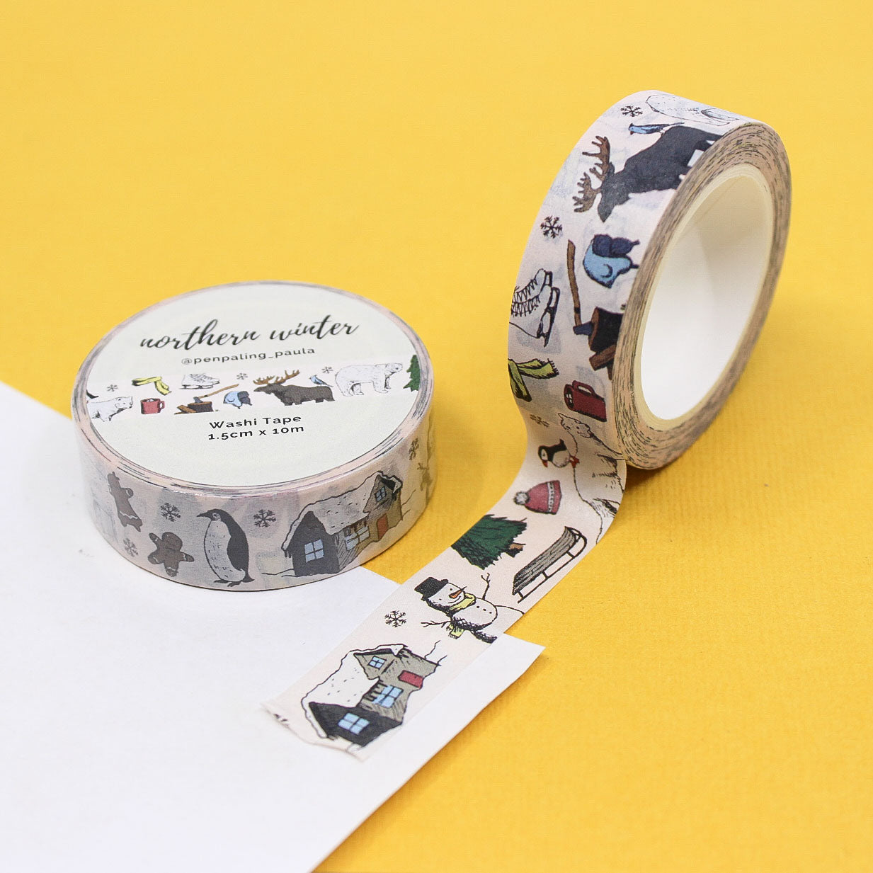 Northern Winter holiday washi tape roll showing polar bear and moose illustrations for Christmas stationery lovers.
