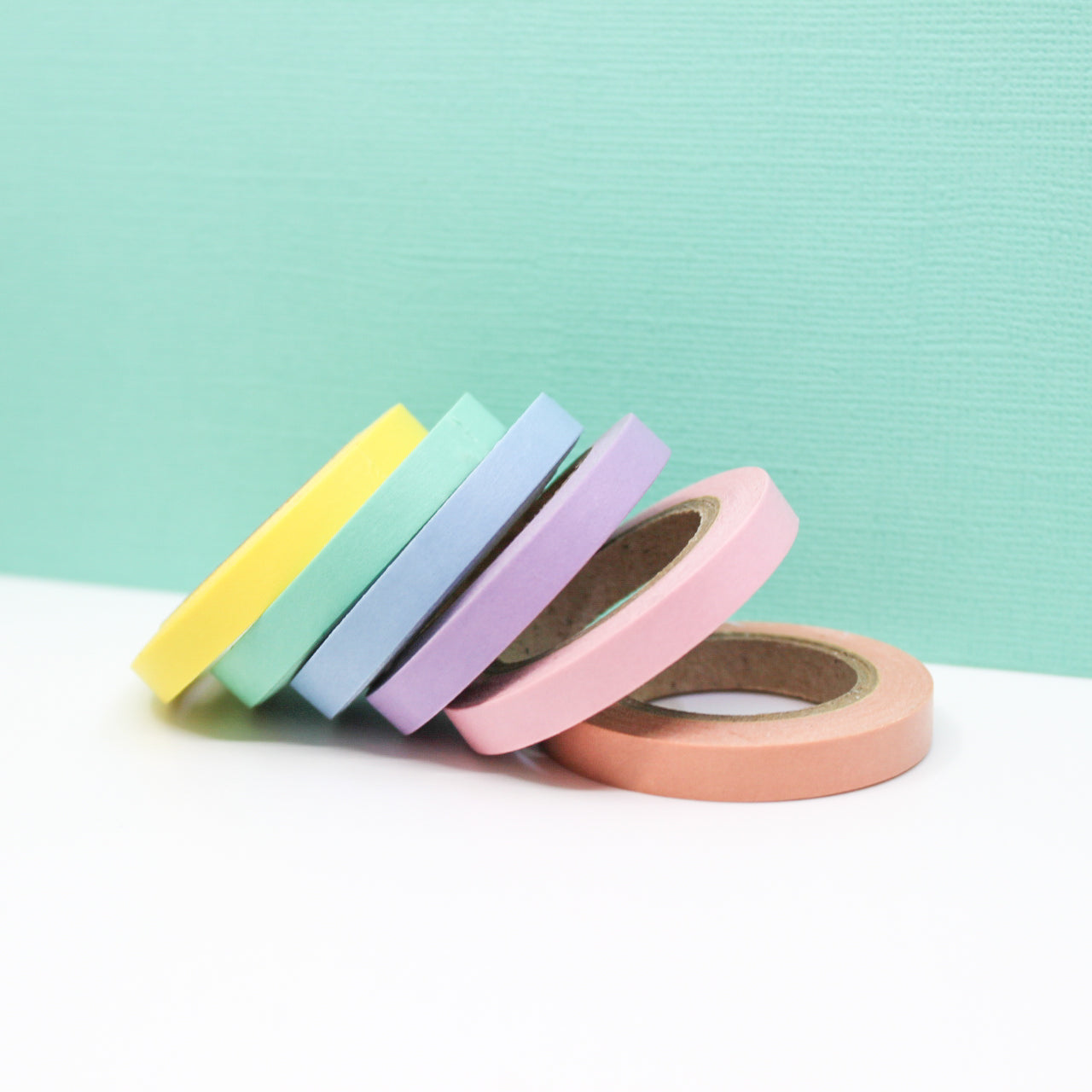 Add a gentle touch to your crafts with our Pastel Color Narrow Solid Washi Tape Set. This set includes a variety of narrow washi tapes in soft pastel hues, ideal for adding a delicate and soothing touch to your projects. This tape is sold at BBB Supplies Craft Shop.