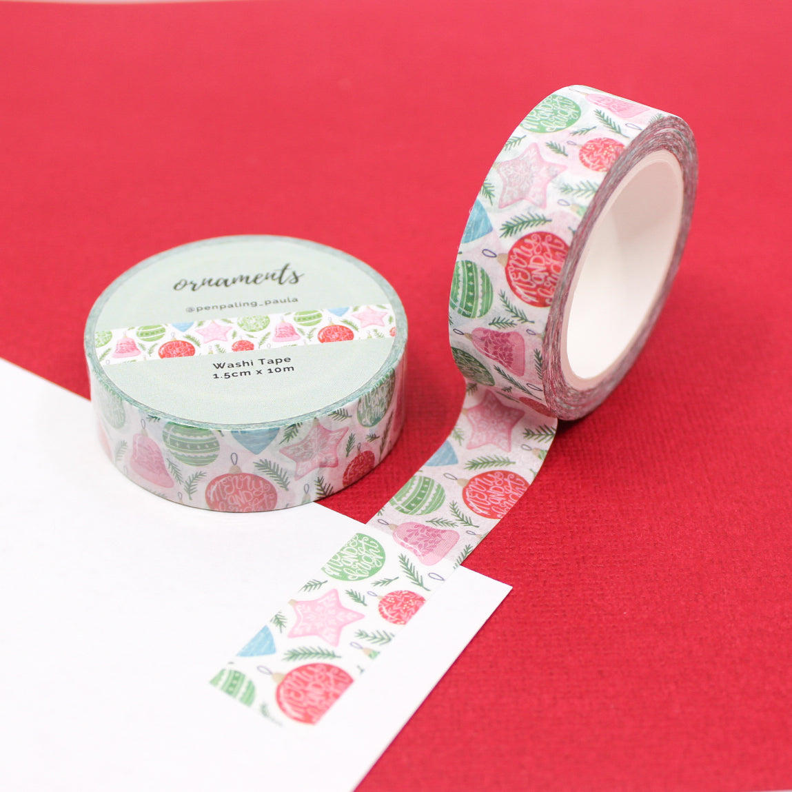 Pink Christmas Ornaments Washi Tape with festive holiday bauble designs, perfect for adding a touch of elegance to your seasonal crafts. This tape is from PenPaling Paula and sold at BBB Supplies Craft Shop.