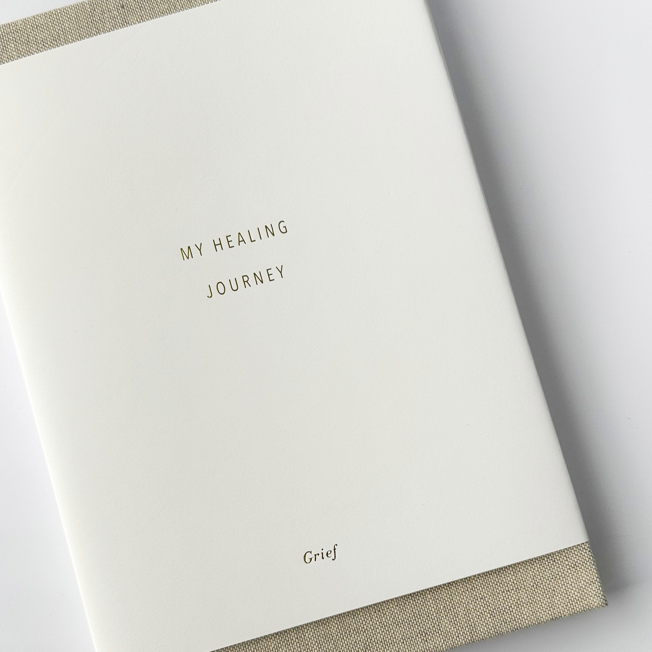 This grief journal offer prompts to help you write about your losses and work through the grieving process at your pace. This journal is from promptly and sold at BBB Supplies Craft Shop.