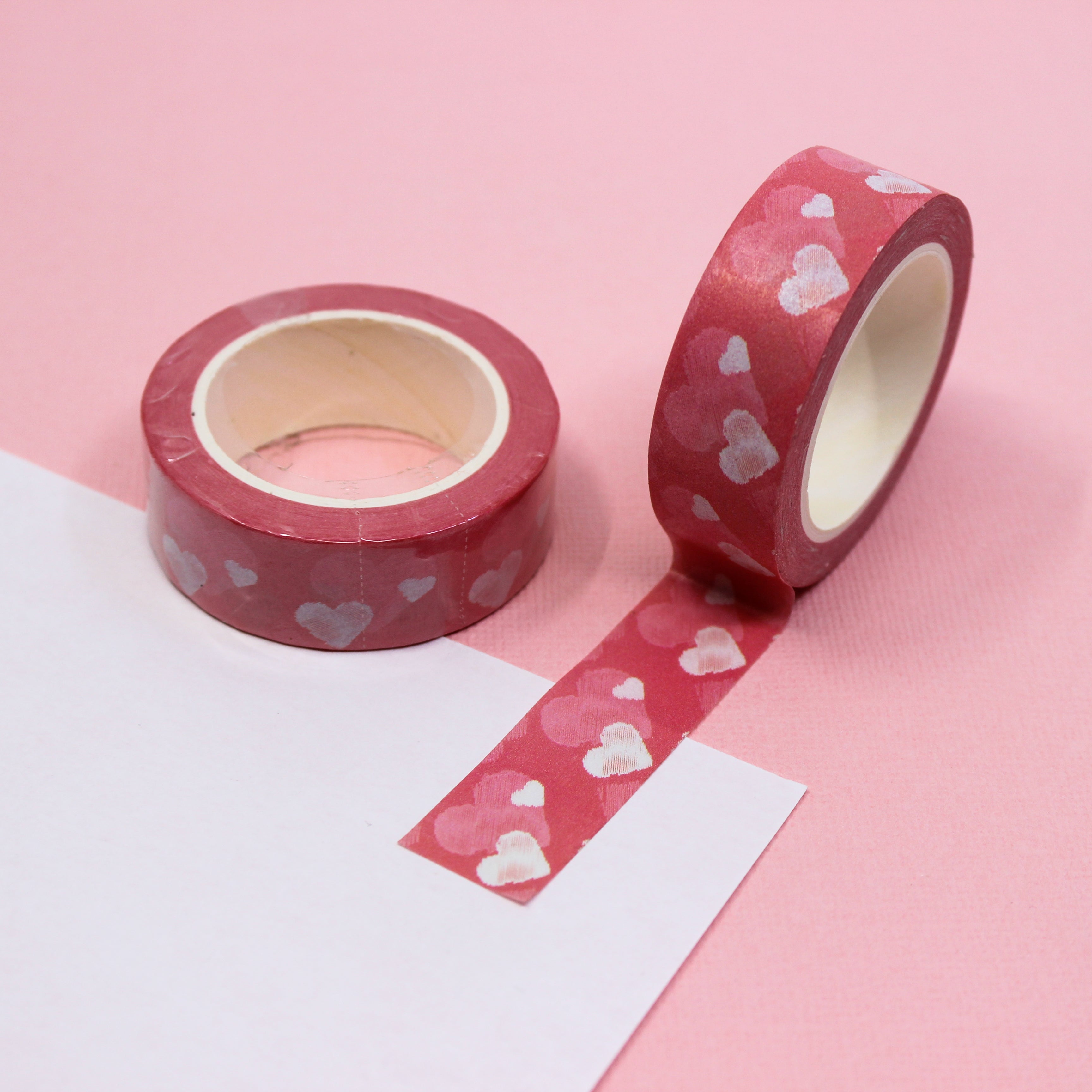 This Layered hearts washi tape beautifully layers pink, red, and white hearts spelling out expressions of love with simply a delicate heart motif. Perfect for adding a romantic touch to your greeting cards, scrapbooks, or gift wrapping, this washi tape exudes warmth and sentiment. This tape is sold at BBB Supplies Craft Shop.