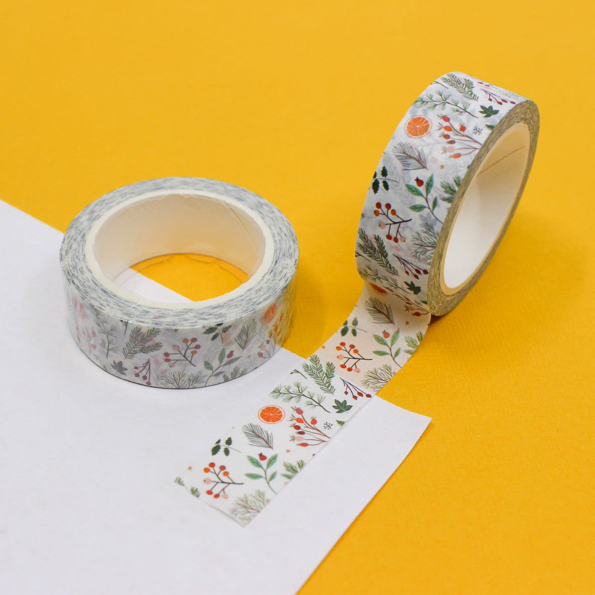 Celebrate the holiday season with this charming washi tape featuring a traditional oranges pattern. The tape's festive design is perfect for adding a touch of warmth and cheer to your holiday-themed projects. This tape is sold at BBB Supplies Craft Shop.