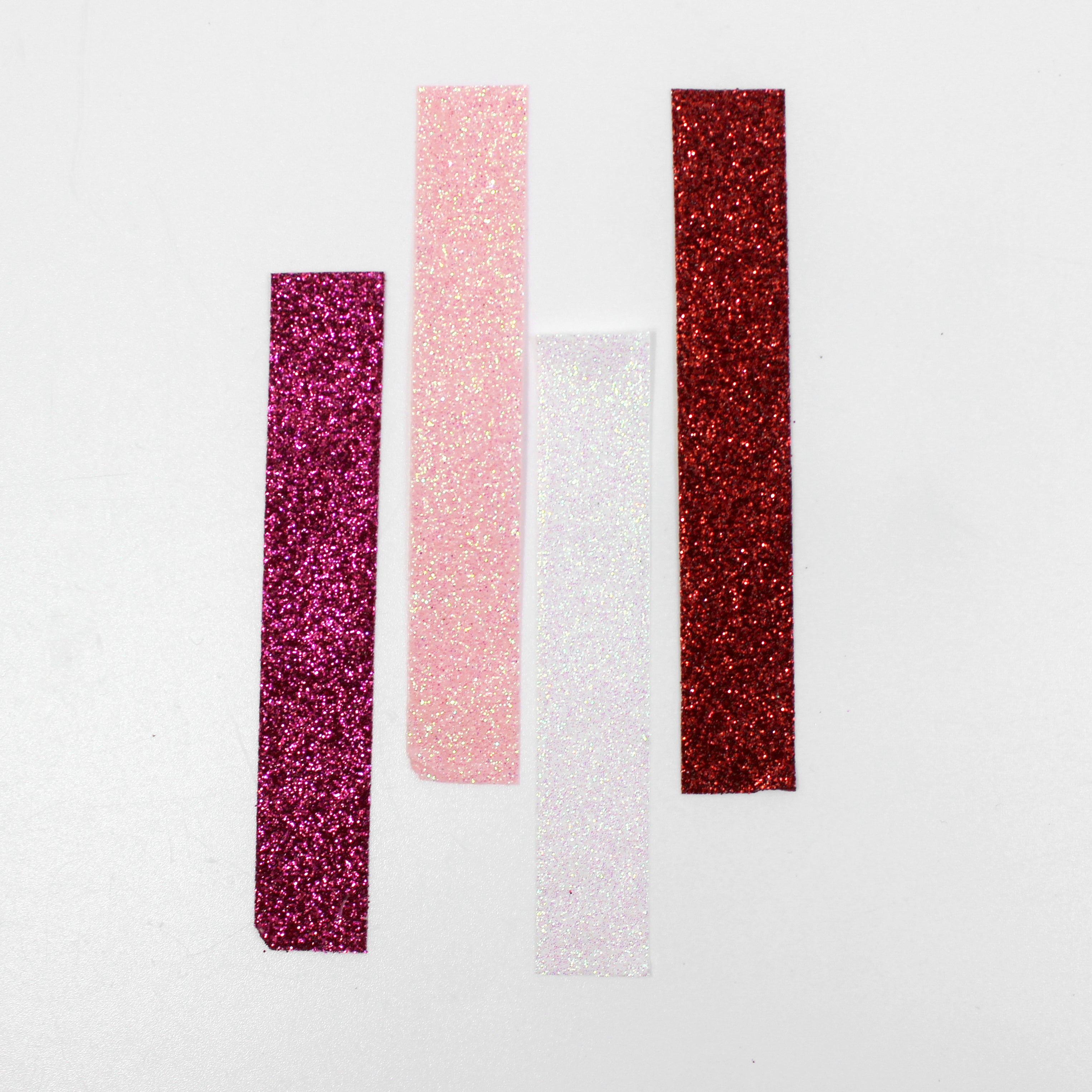 Capture the spirit of love with our Valentine's glitter washi tape, featuring sparkling hearts and romantic motifs in shades of red and pink, perfect for adding a touch of heartfelt sparkle to your crafts. This tape is sold at BBB Supplies Craft Shop.