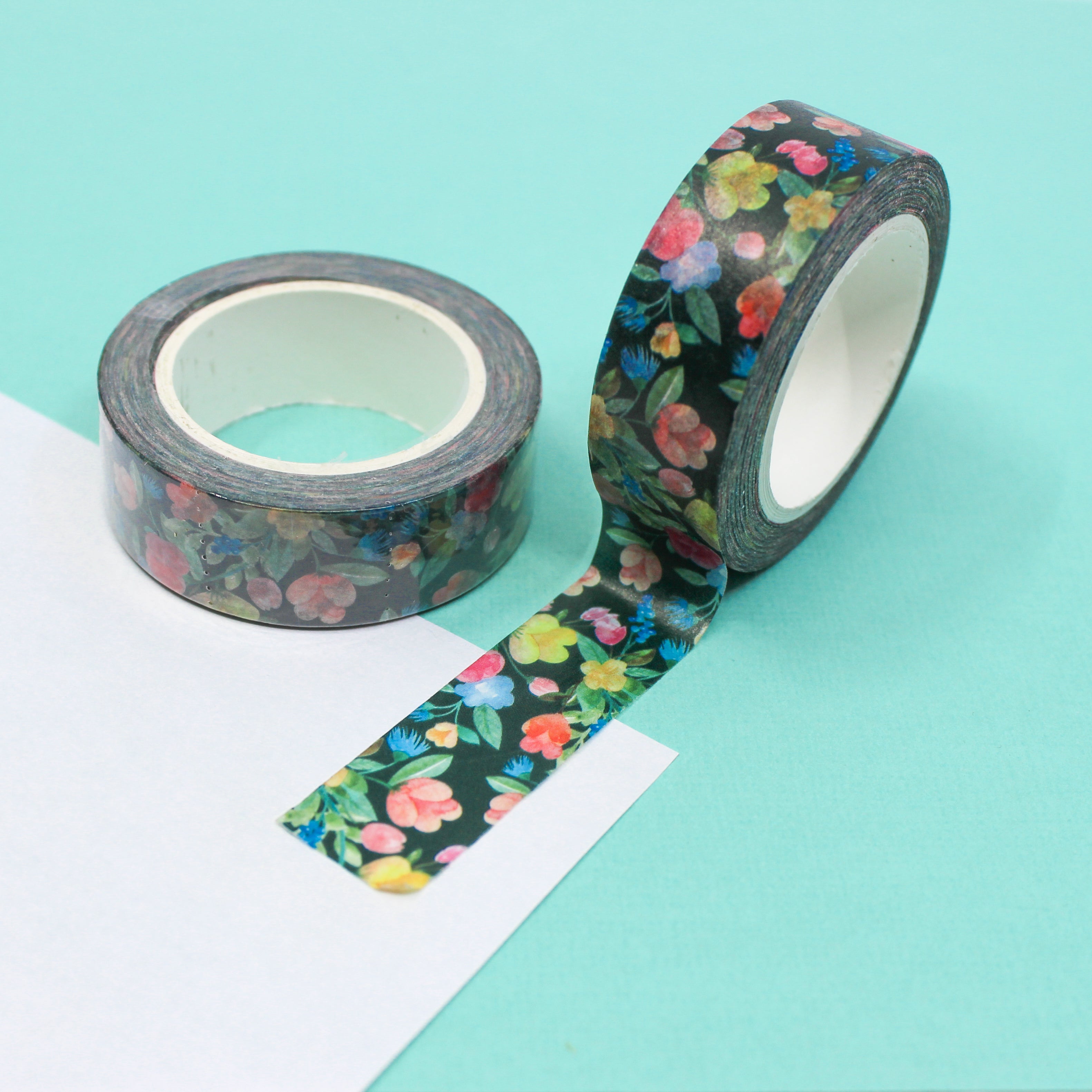 Infuse vibrance into your projects with our striking bright flower on black background washi tape, adding a pop of color to your creations. This floral tape is sold at BBB Supplies Craft Shop.