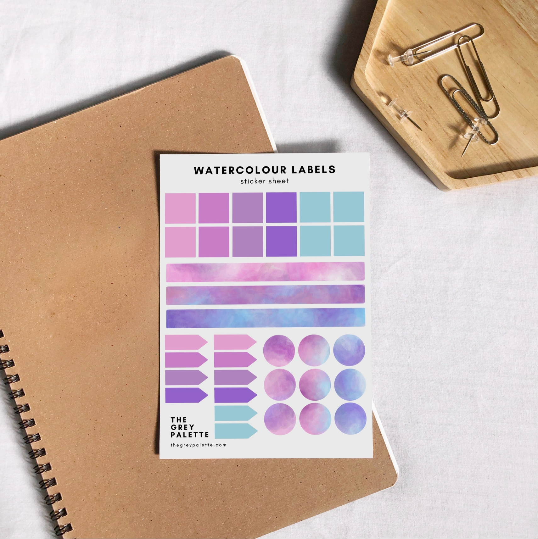 Watercolor labels sticker sheets featuring squares, long labels, arrow pointers, and circles in three different pastel watercolor shades, ideal for journaling and planning.