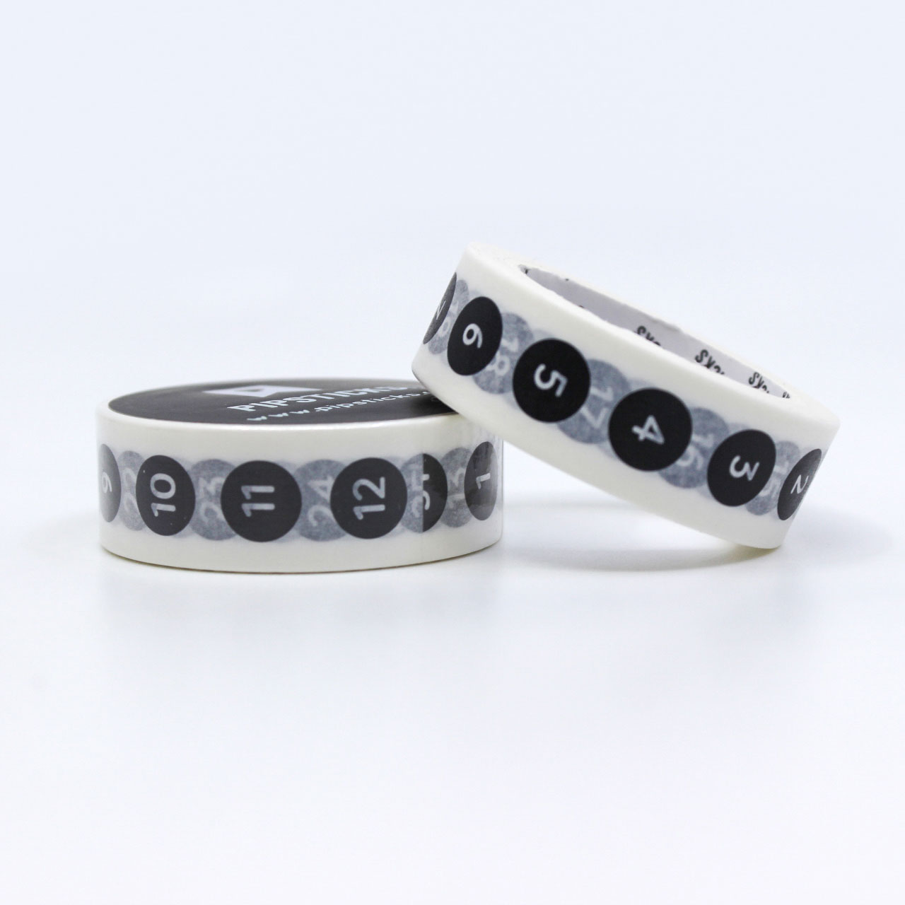 Washi tape featuring numbers in white text on black circles for stylish task tracking.