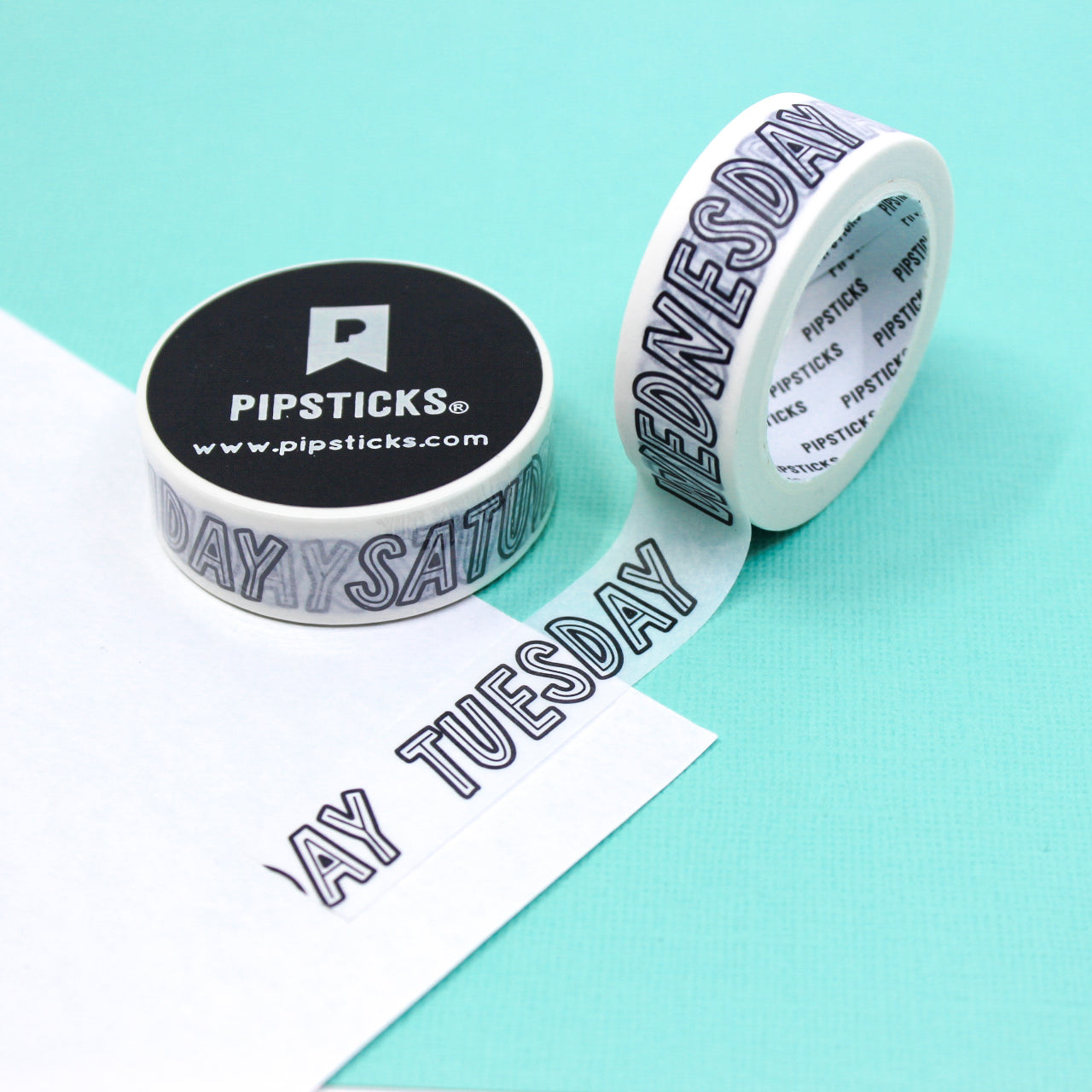 Black and white washi tape with bold days of the week lettering for planners and journals.
